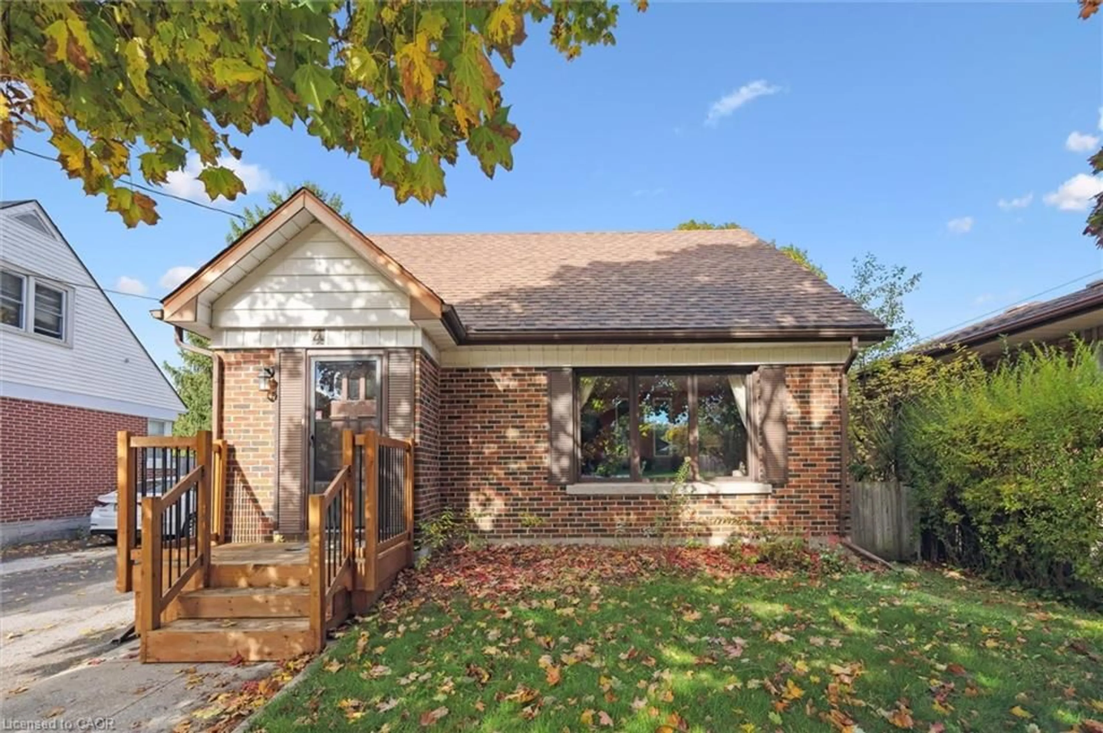 Home with brick exterior material, street for 4 Balsarroch Pl, Guelph Ontario N1E 3J5