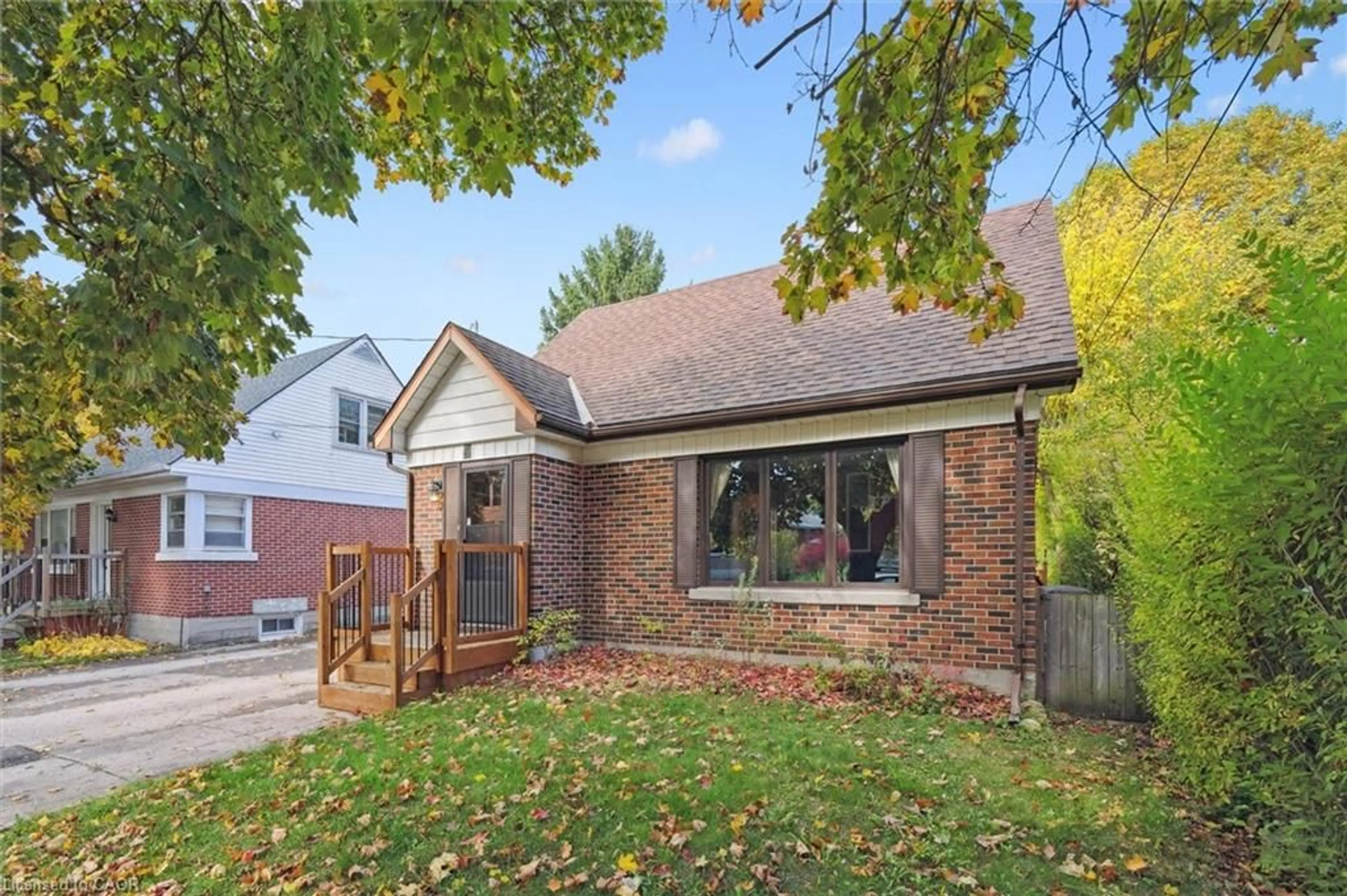 Home with brick exterior material, street for 4 Balsarroch Pl, Guelph Ontario N1E 3J5
