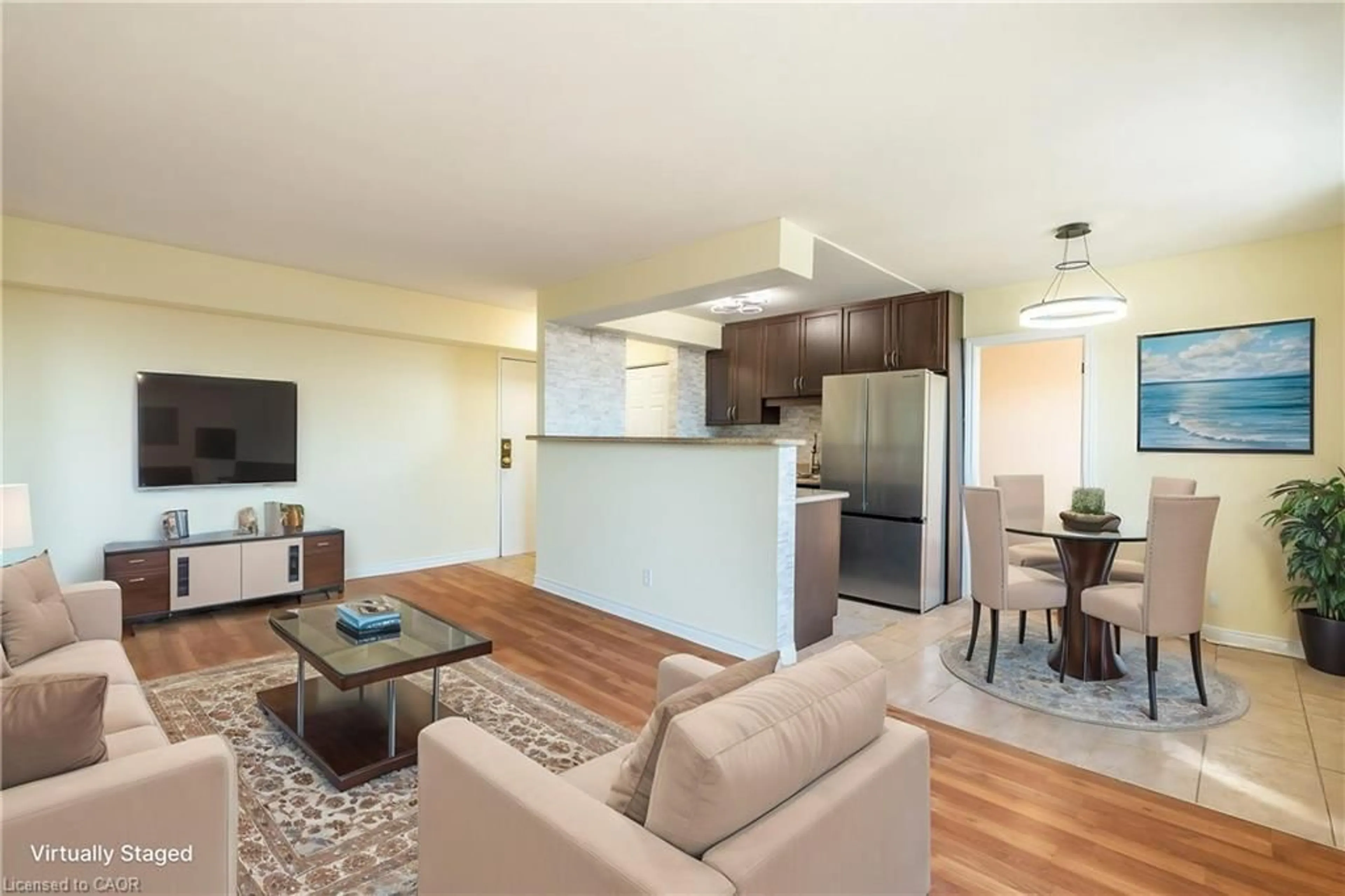 Living room with furniture, wood/laminate floor for 851 Queenston Rd #803, Hamilton Ontario L8G 1B4