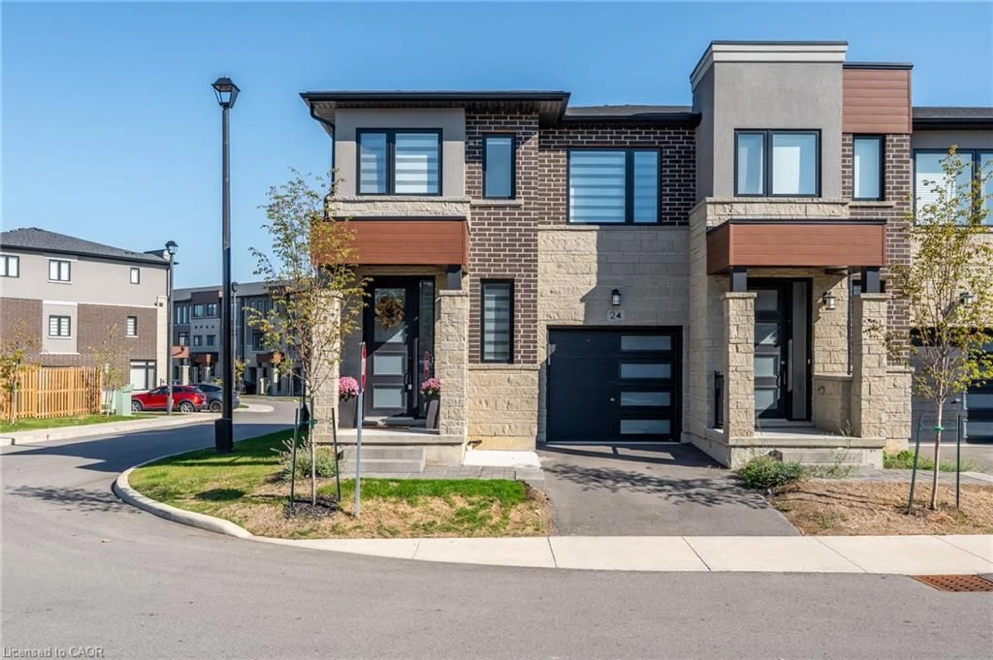 Home with brick exterior material, street for 24 Southam Lane, Hamilton Ontario L9C 0E9