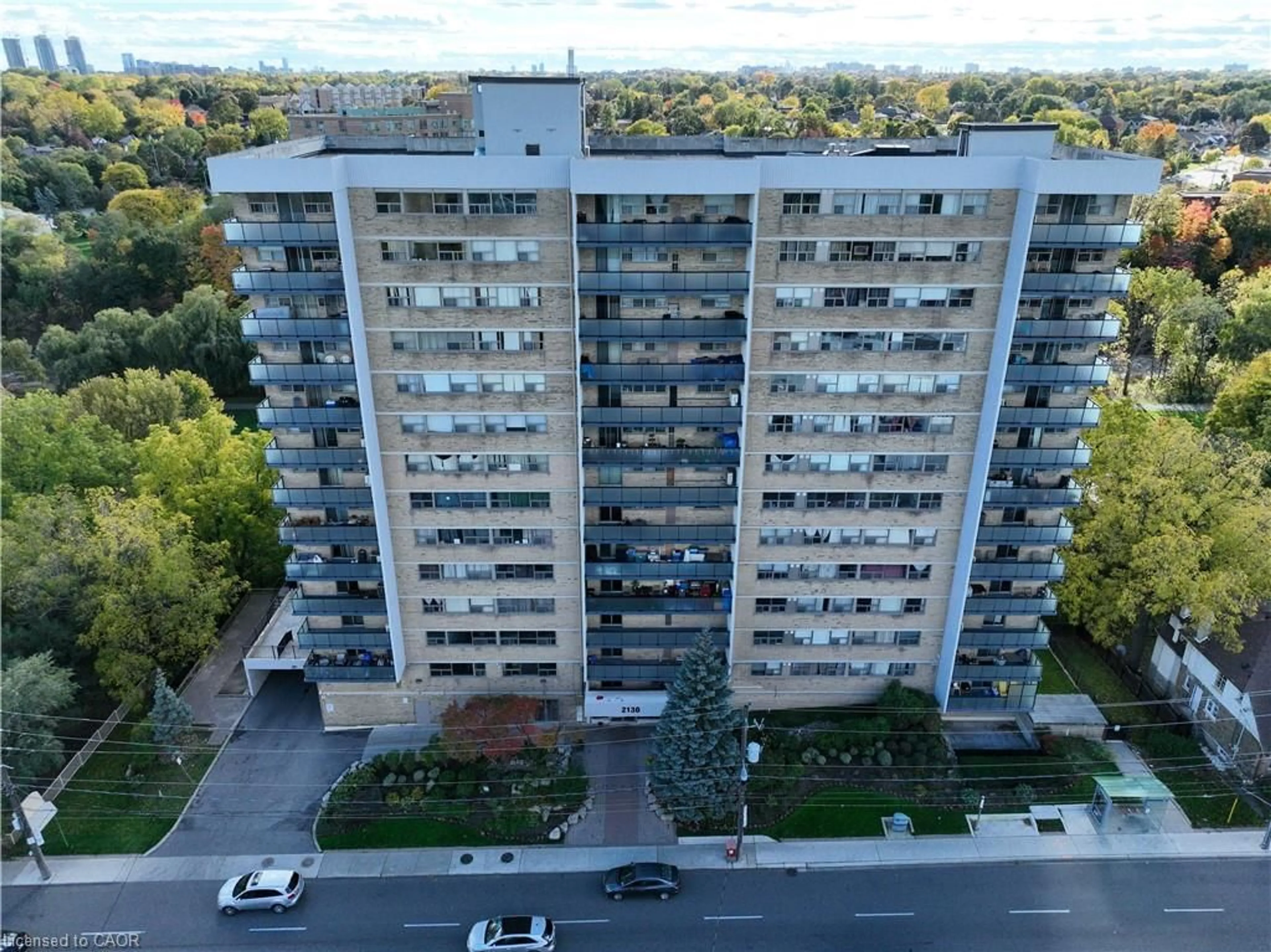 A pic from outside/outdoor area/front of a property/back of a property/a pic from drone, city buildings view from balcony for 2130 Weston Rd #405, Toronto Ontario M3N 3R9