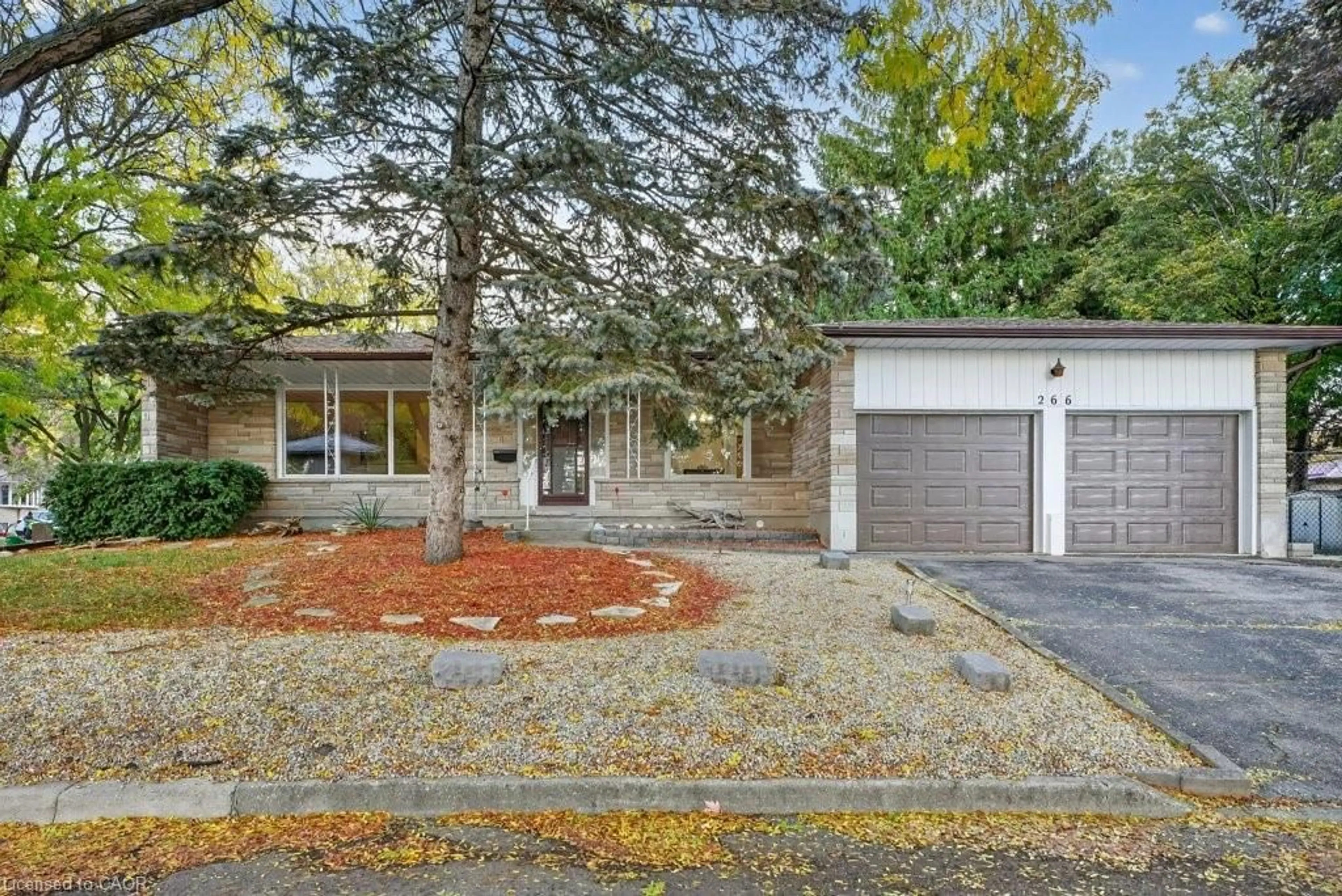 Home with brick exterior material, street for 266 Grangewood Crt, Waterloo Ontario N2K 2E7
