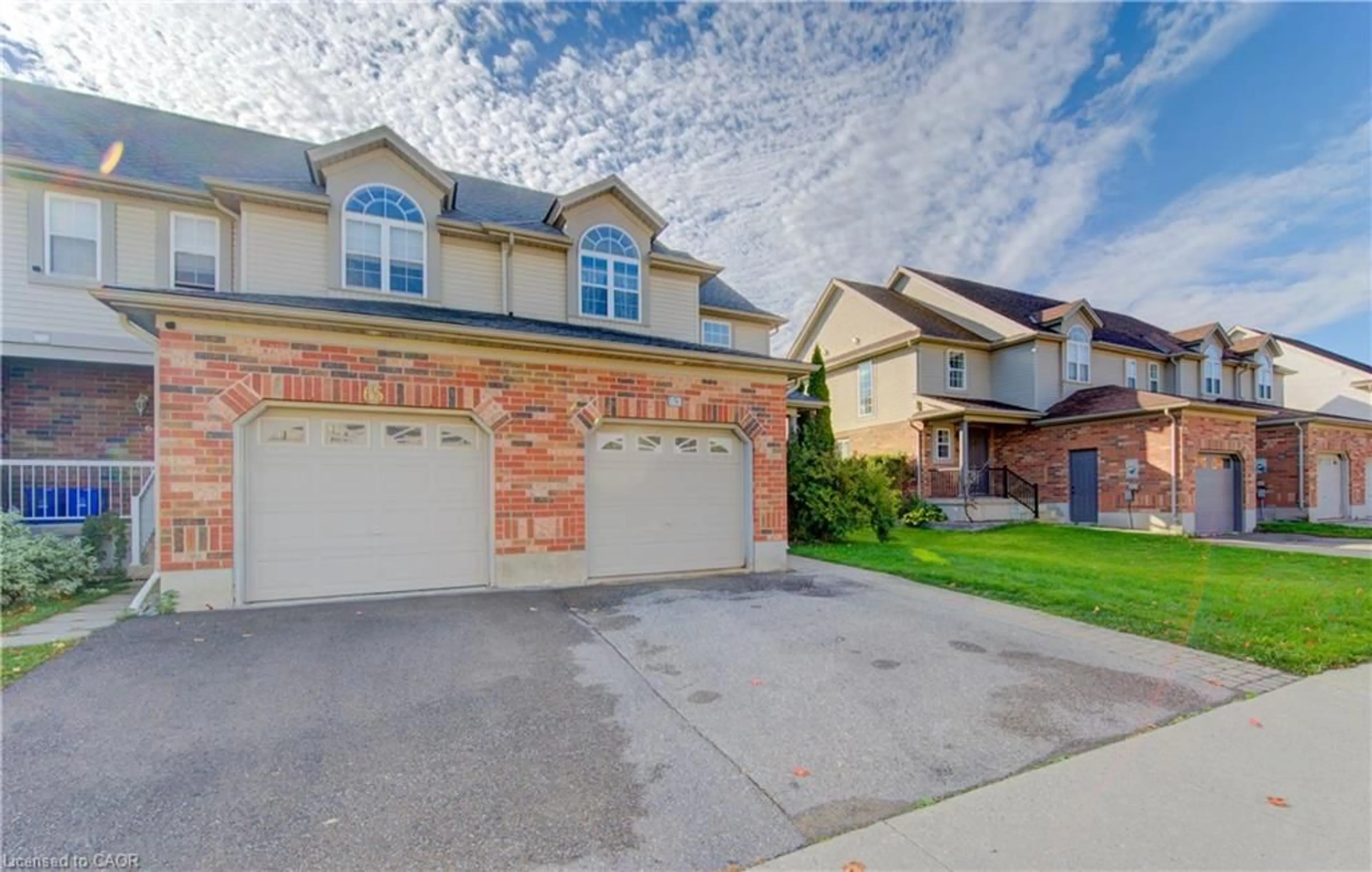Home with brick exterior material, street for 63 Swartz St, Kitchener Ontario N2E 4A6