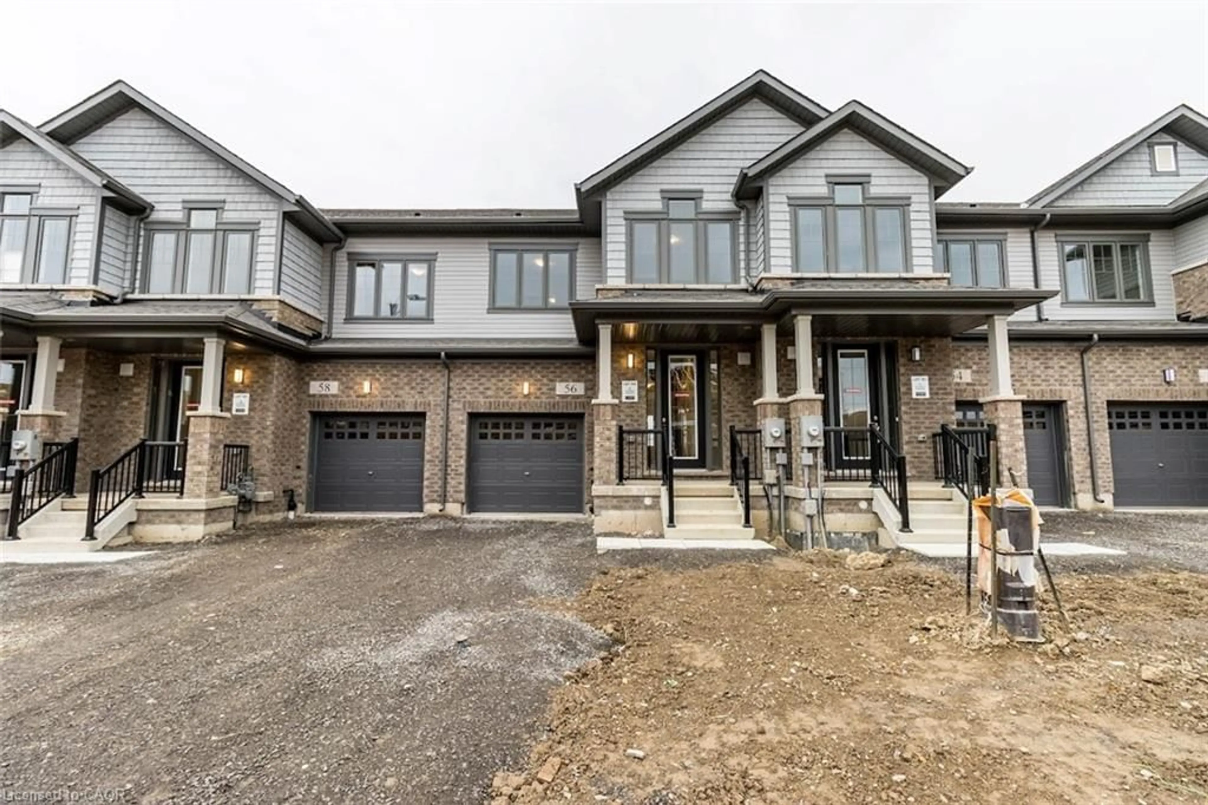 Home with brick exterior material, street for 56 Freedom Cres, Hamilton Ontario L0R 1W0