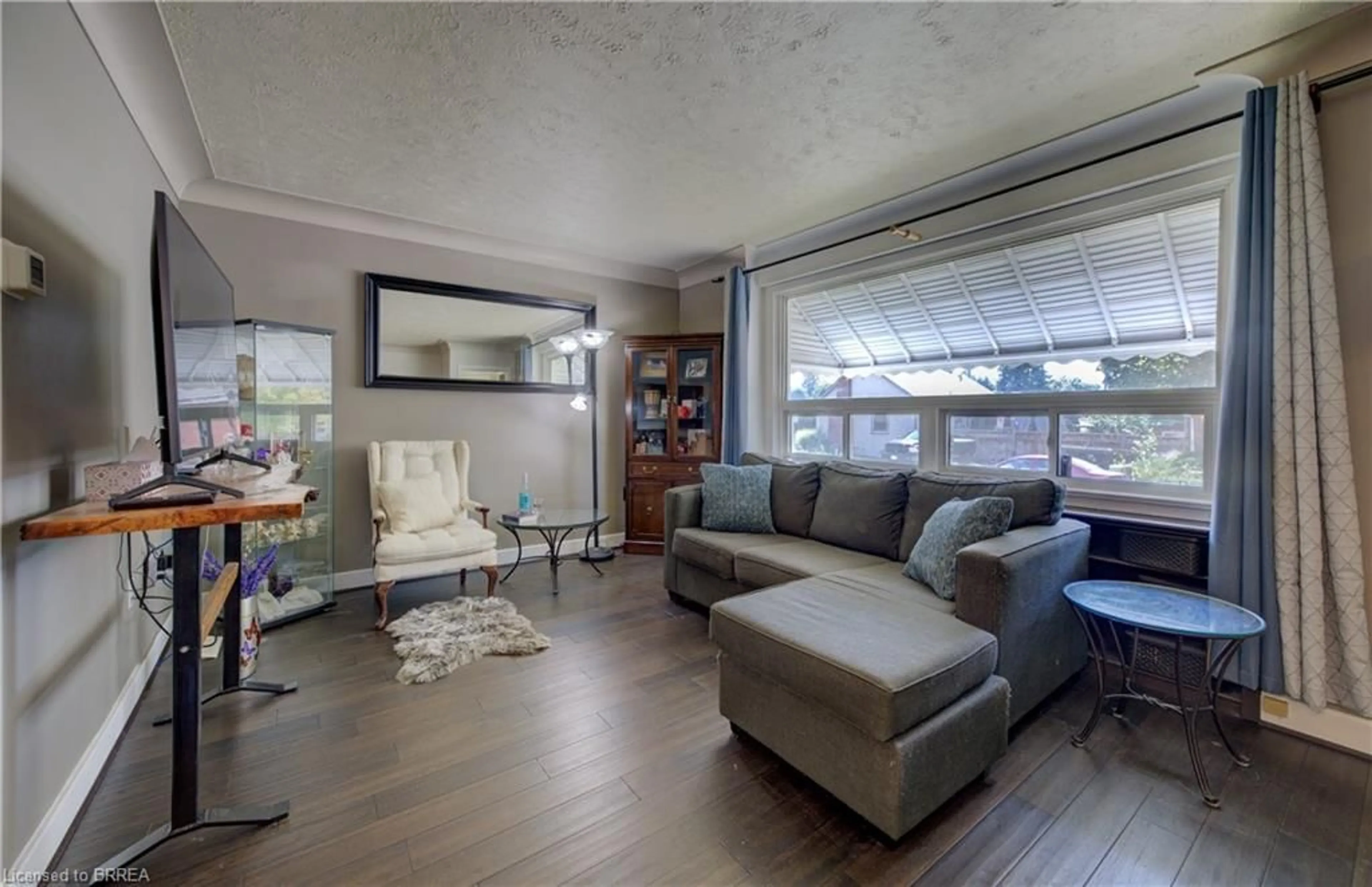 Living room with furniture, unknown for 81 Strathcona Ave, Brantford Ontario N3S 1T7