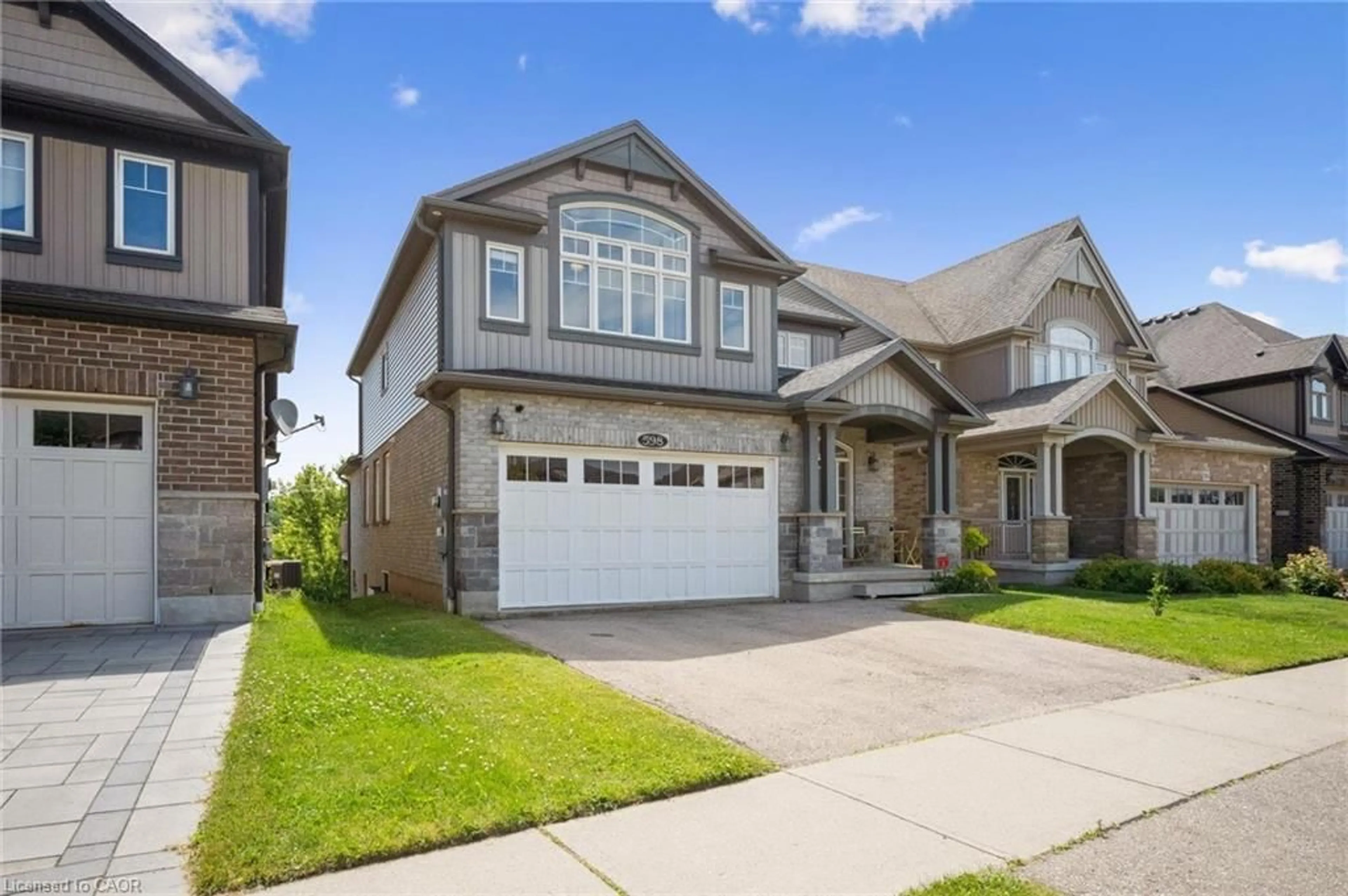Home with brick exterior material, street for 598 Sundew Dr, Waterloo Ontario N2V 0B9