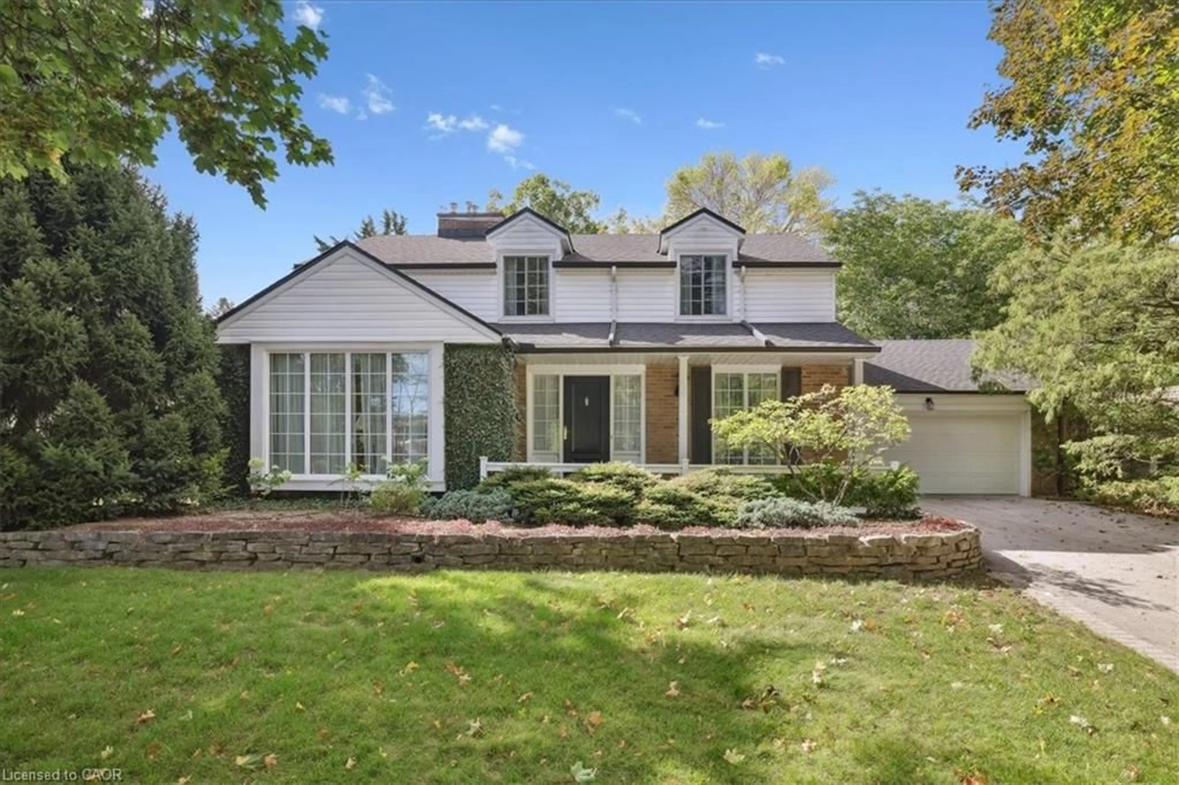 Home with brick exterior material, street for 222 Strathcona Dr, Burlington Ontario L7L 2C8