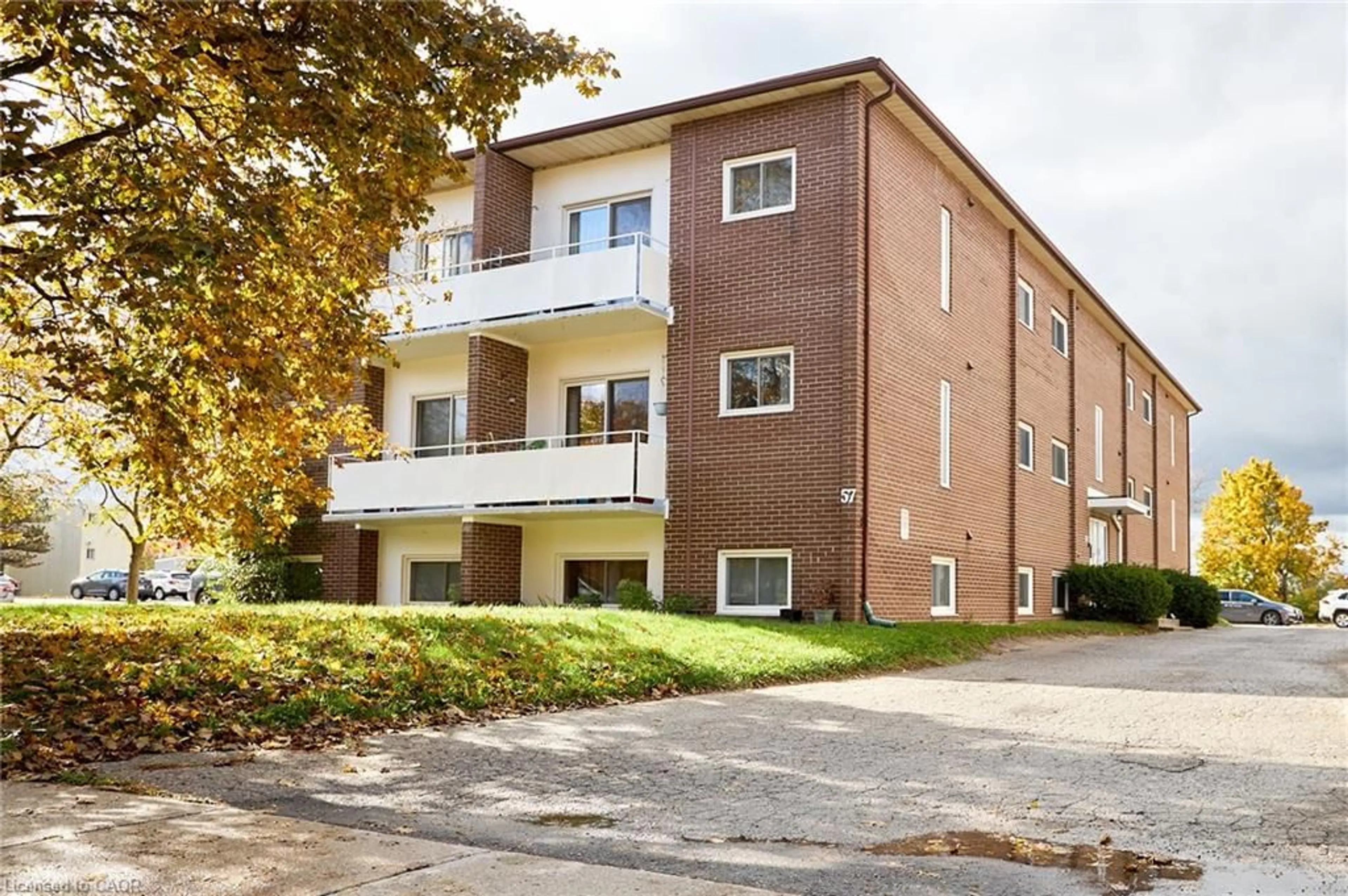 Home with brick exterior material, street for 57 Conroy Cres #204, Guelph Ontario N1G 2V5