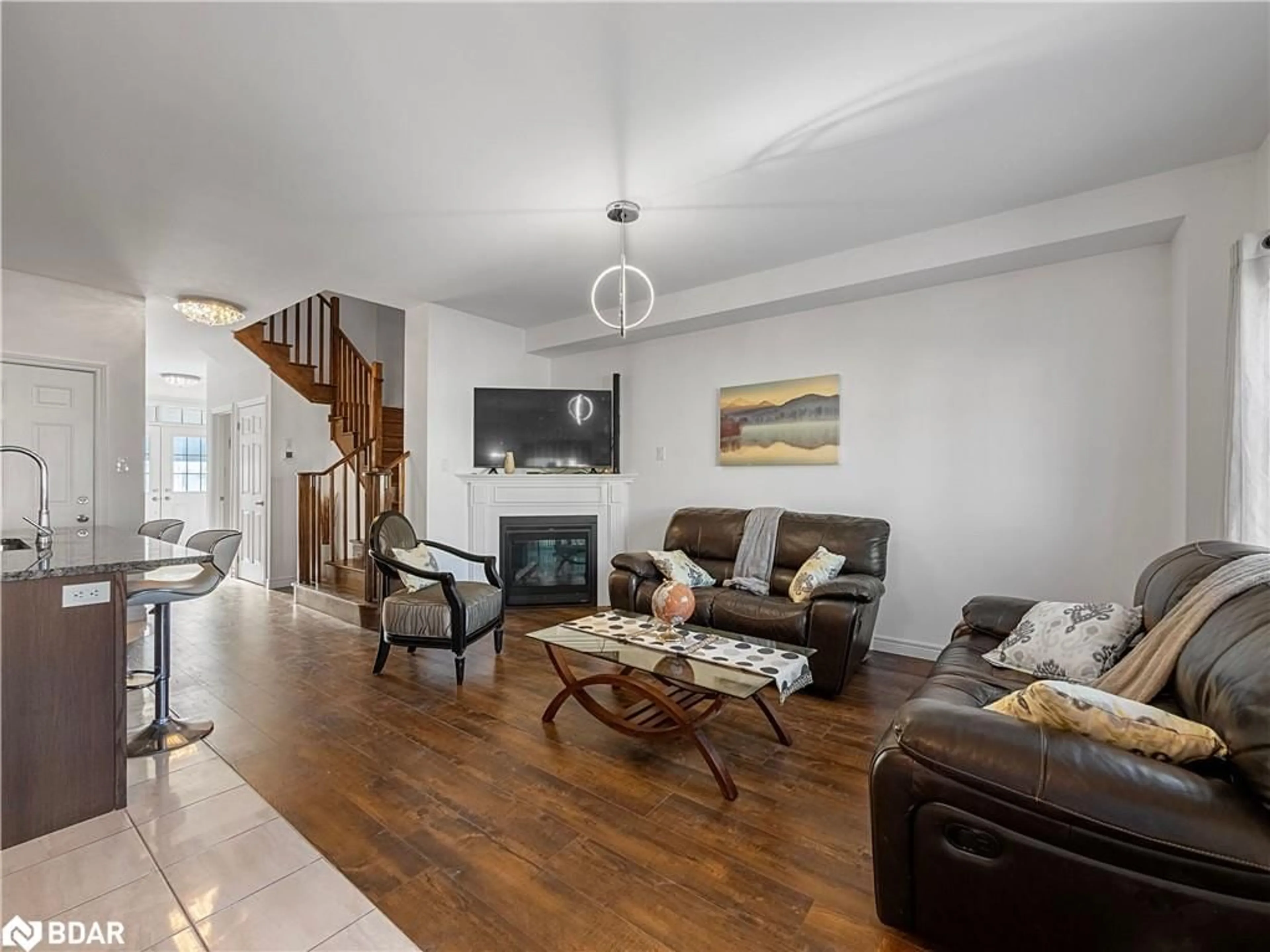 Living room with furniture, wood/laminate floor for 161 Clark St, Shelburne Ontario L0N 1S3