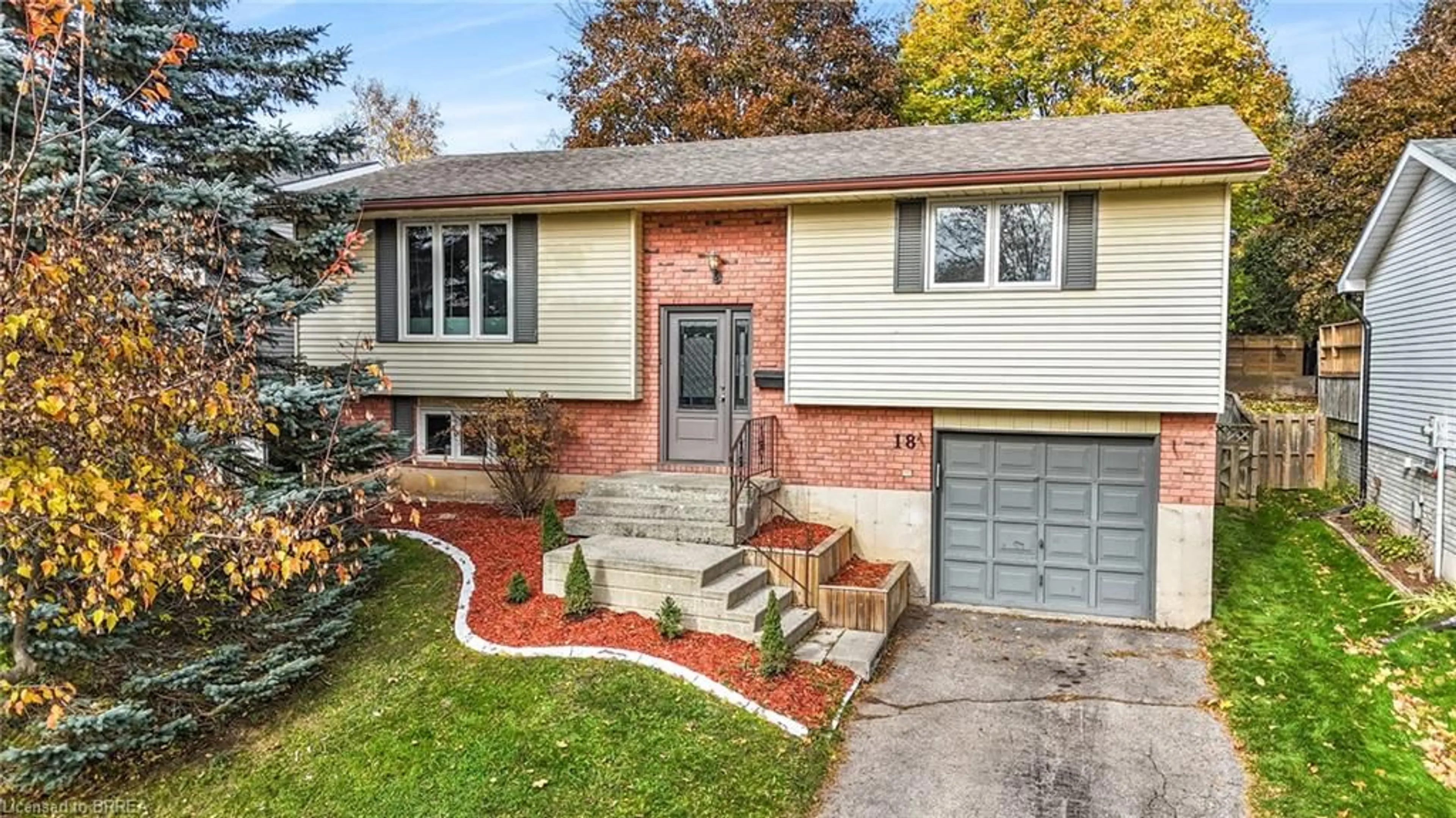 Home with brick exterior material, street for 18 Sandlewood Ave, Brantford Ontario N3V 1C6