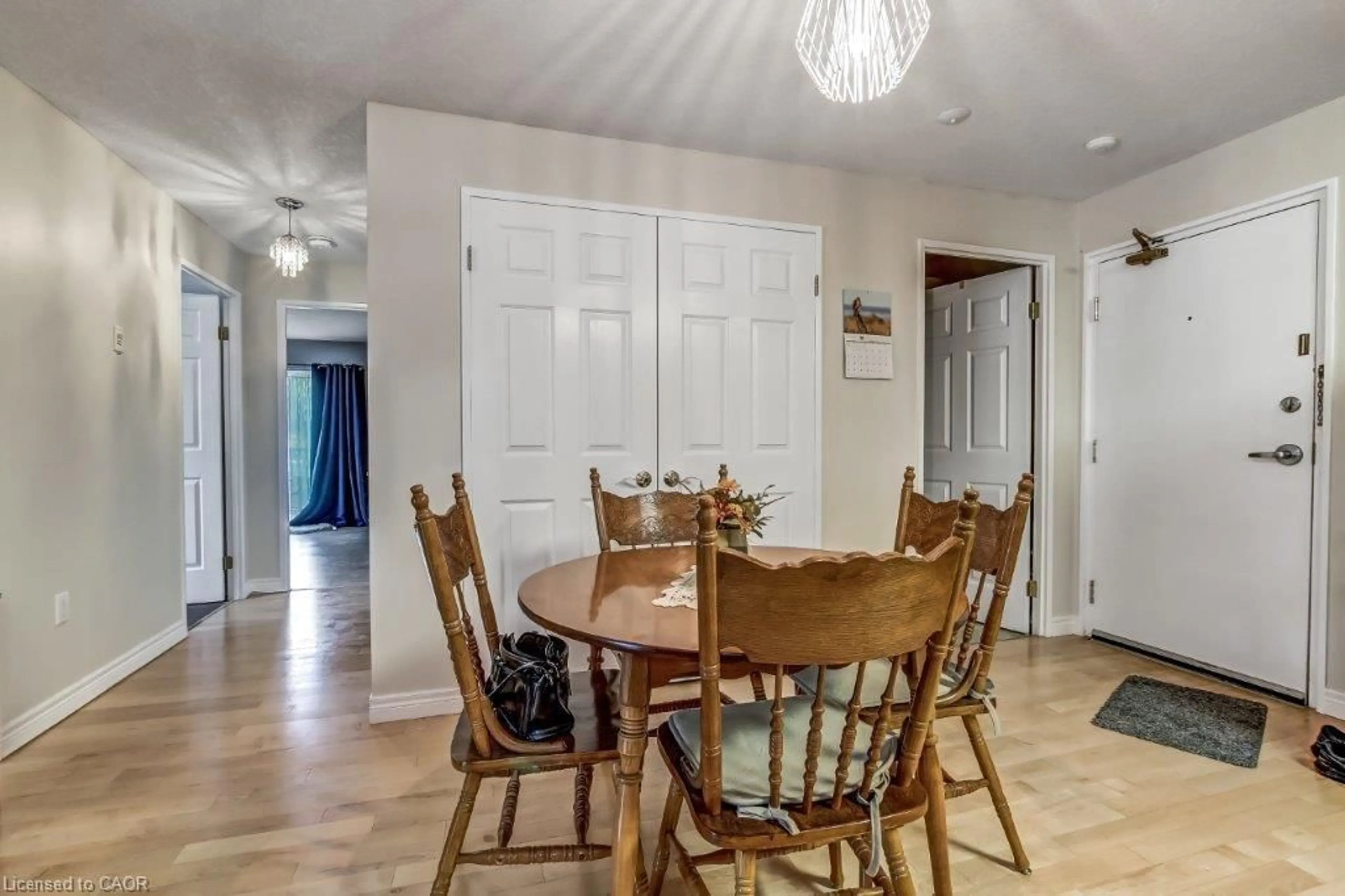 Dining room, wood/laminate floor for 12 St Andrew St #105, Port Dover Ontario N0A 1N1