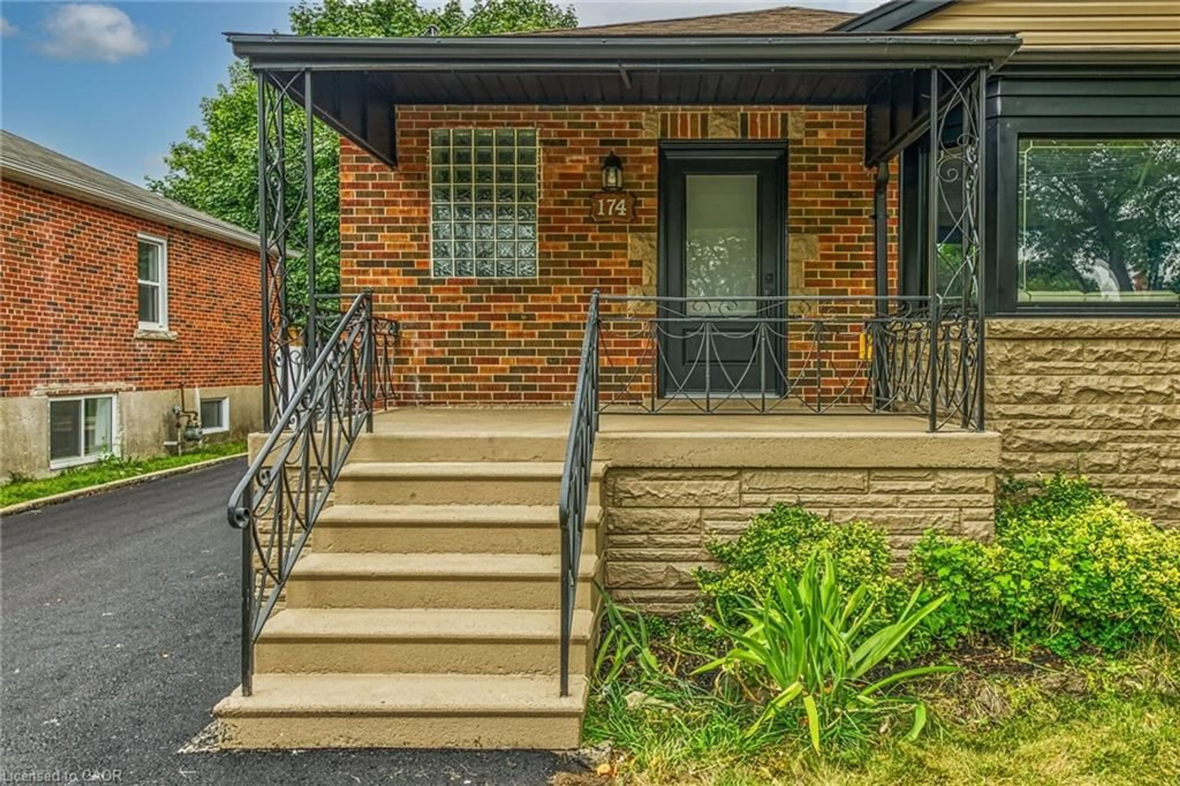 Home with brick exterior material, street for 174 East 34th St, Hamilton Ontario L8V 3W6