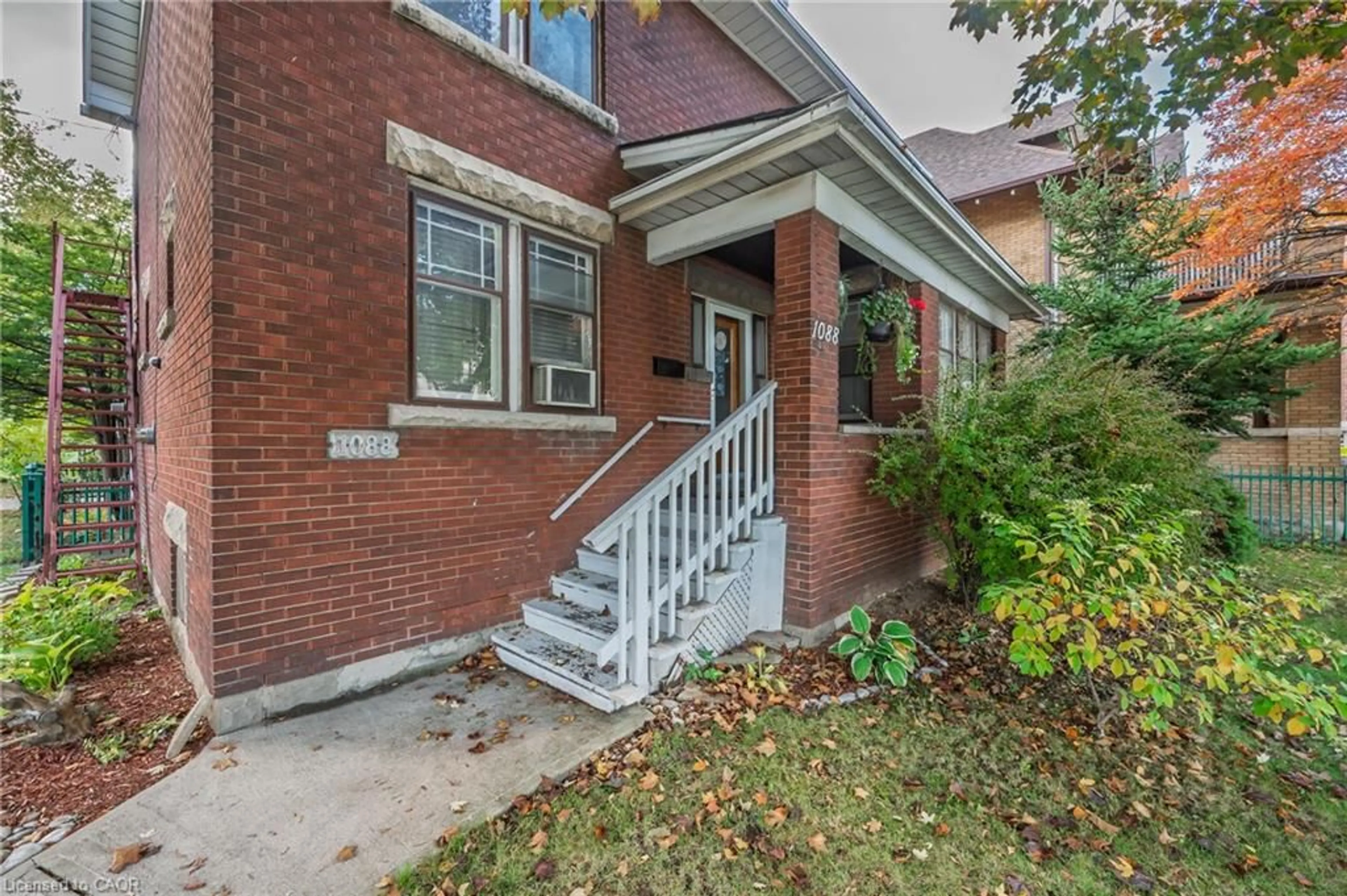 Home with brick exterior material, street for 1088 King St, Hamilton Ontario L8M 1E3