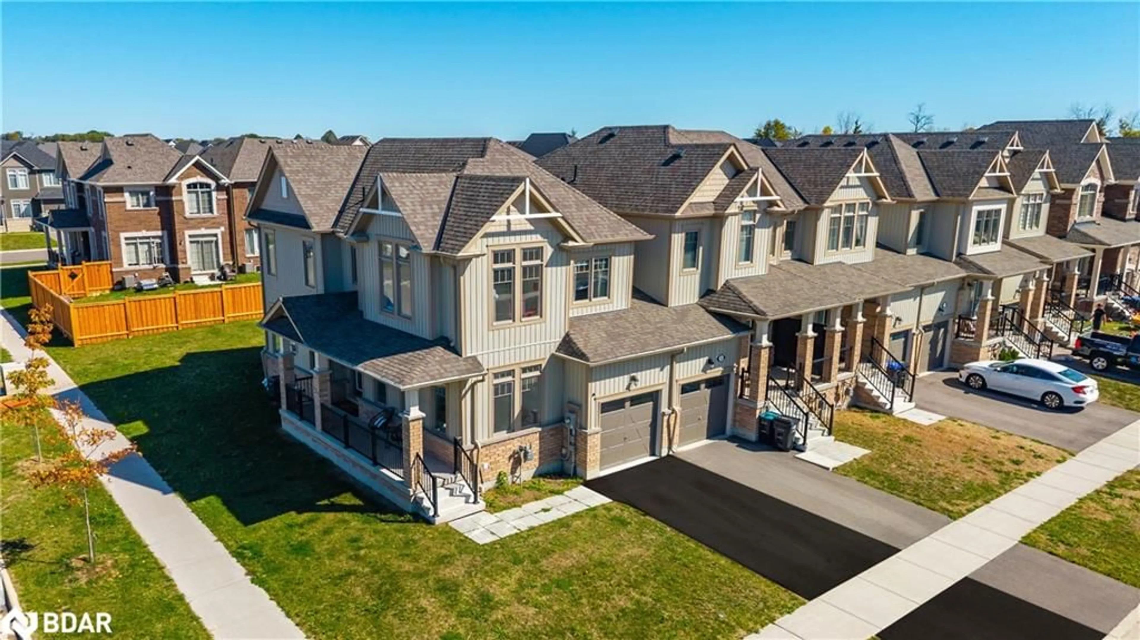 A pic from outside/outdoor area/front of a property/back of a property/a pic from drone, street for 58 Tracey Lane, Collingwood Ontario L9Y 3V2