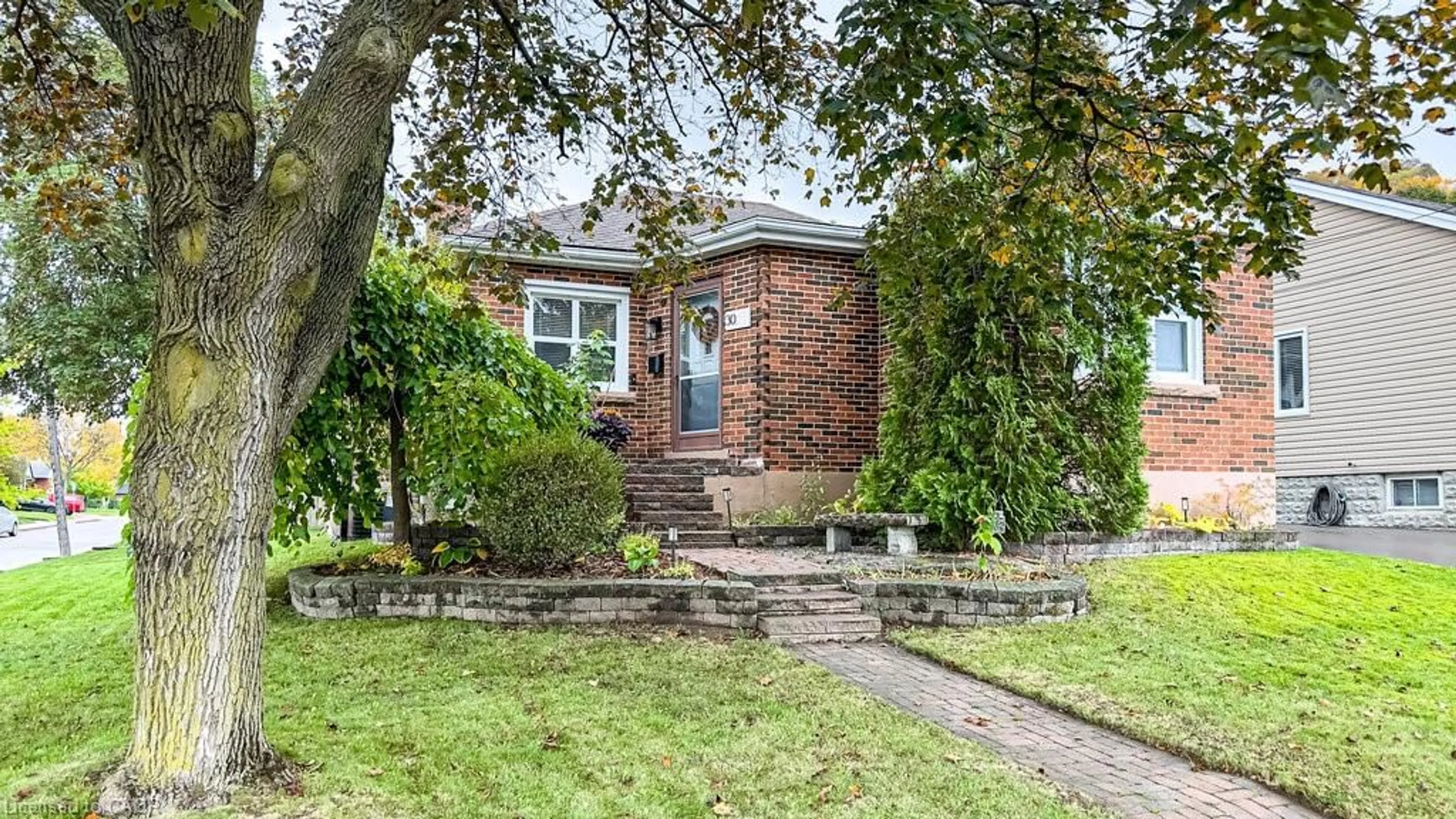 Home with brick exterior material, street for 30 Montrose Ave, Hamilton Ontario L8K 4X9