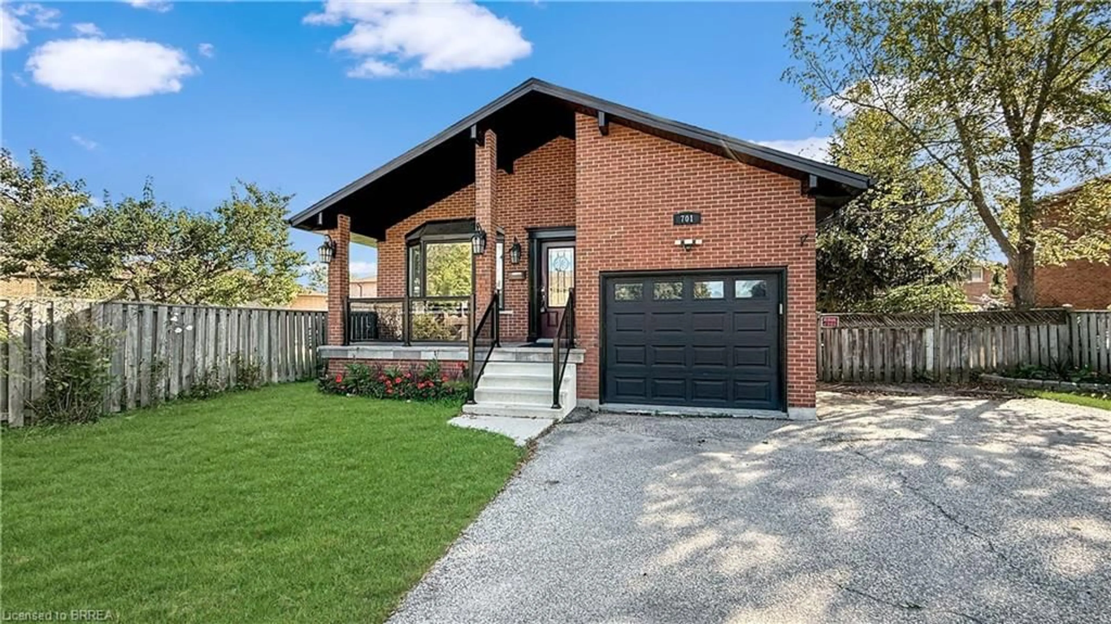 Home with brick exterior material, street for 701 Upper Paradise Rd, Hamilton Ontario L9C 5R1
