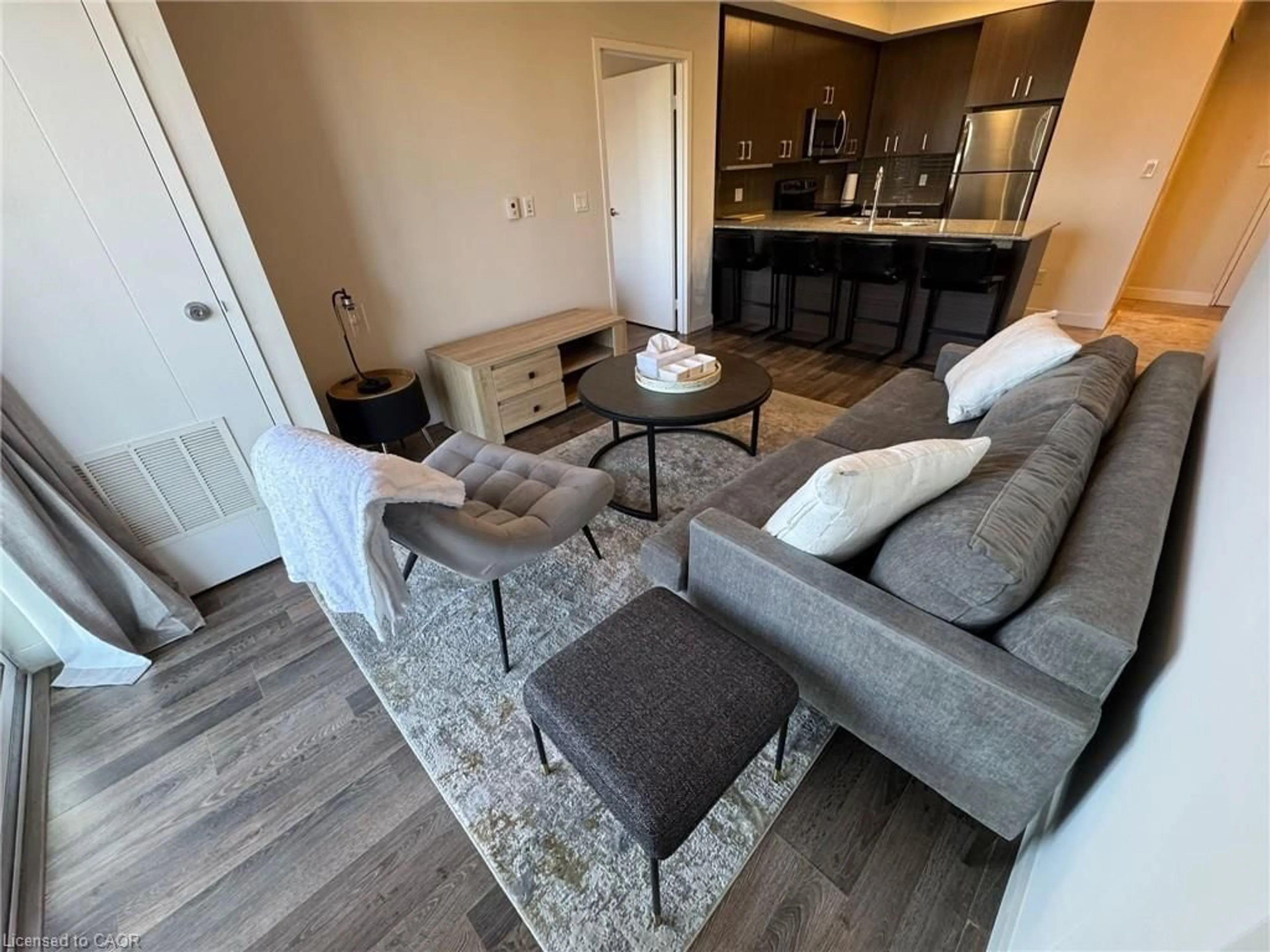 Living room with furniture, unknown for 62 Balsam St #H405, Waterloo Ontario N2L 3H2