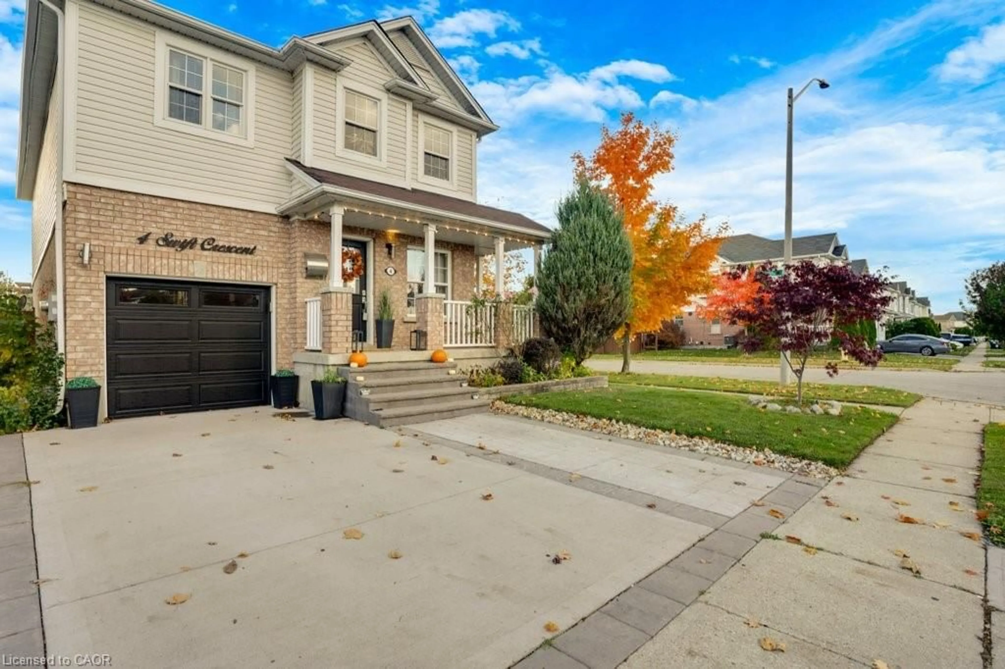Home with vinyl exterior material, street for 4 Swift Cres, Cambridge Ontario N1P 1J4