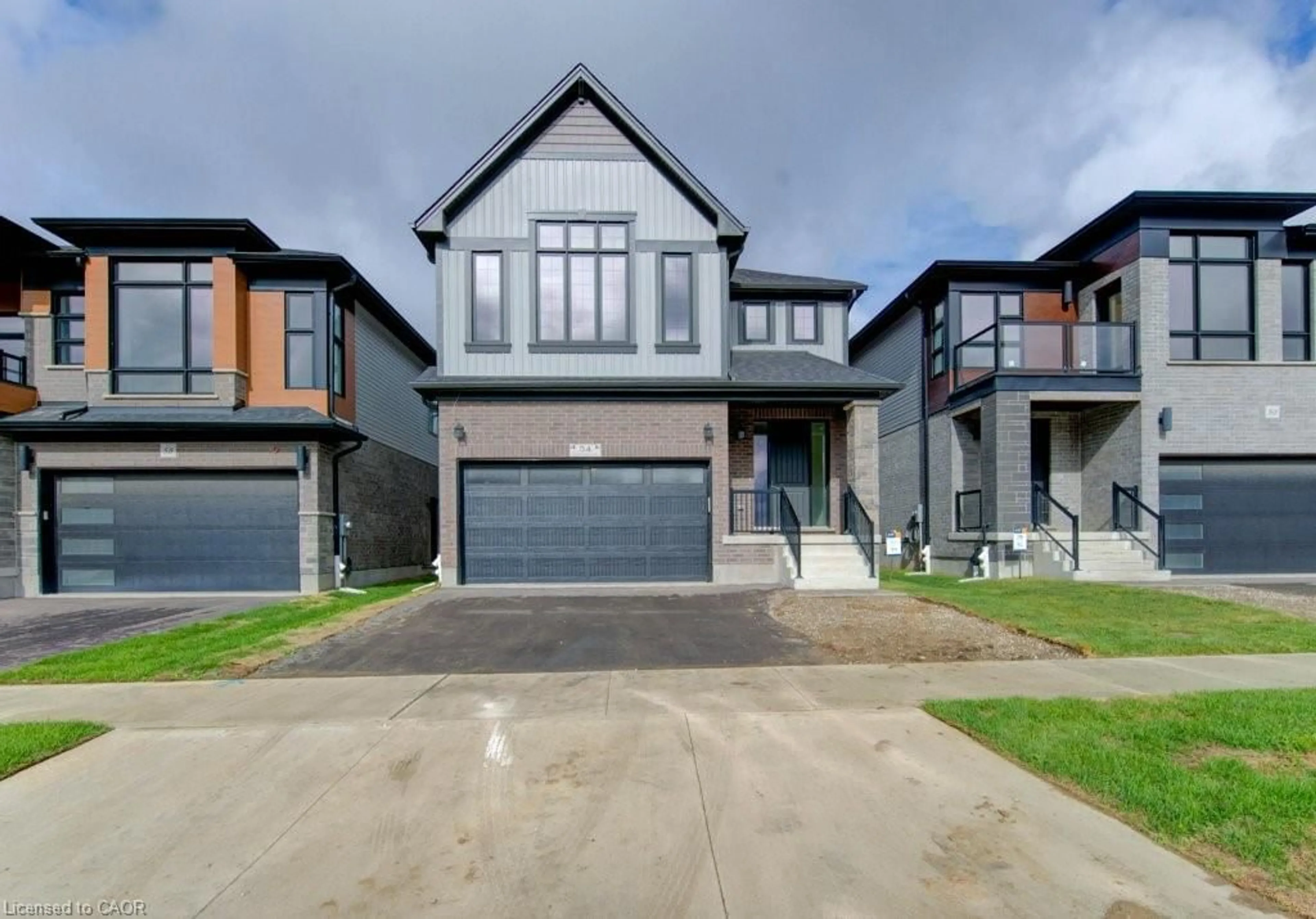 Home with brick exterior material, street for 54 Jacob Detweiller Dr, Kitchener Ontario N2P 0K7