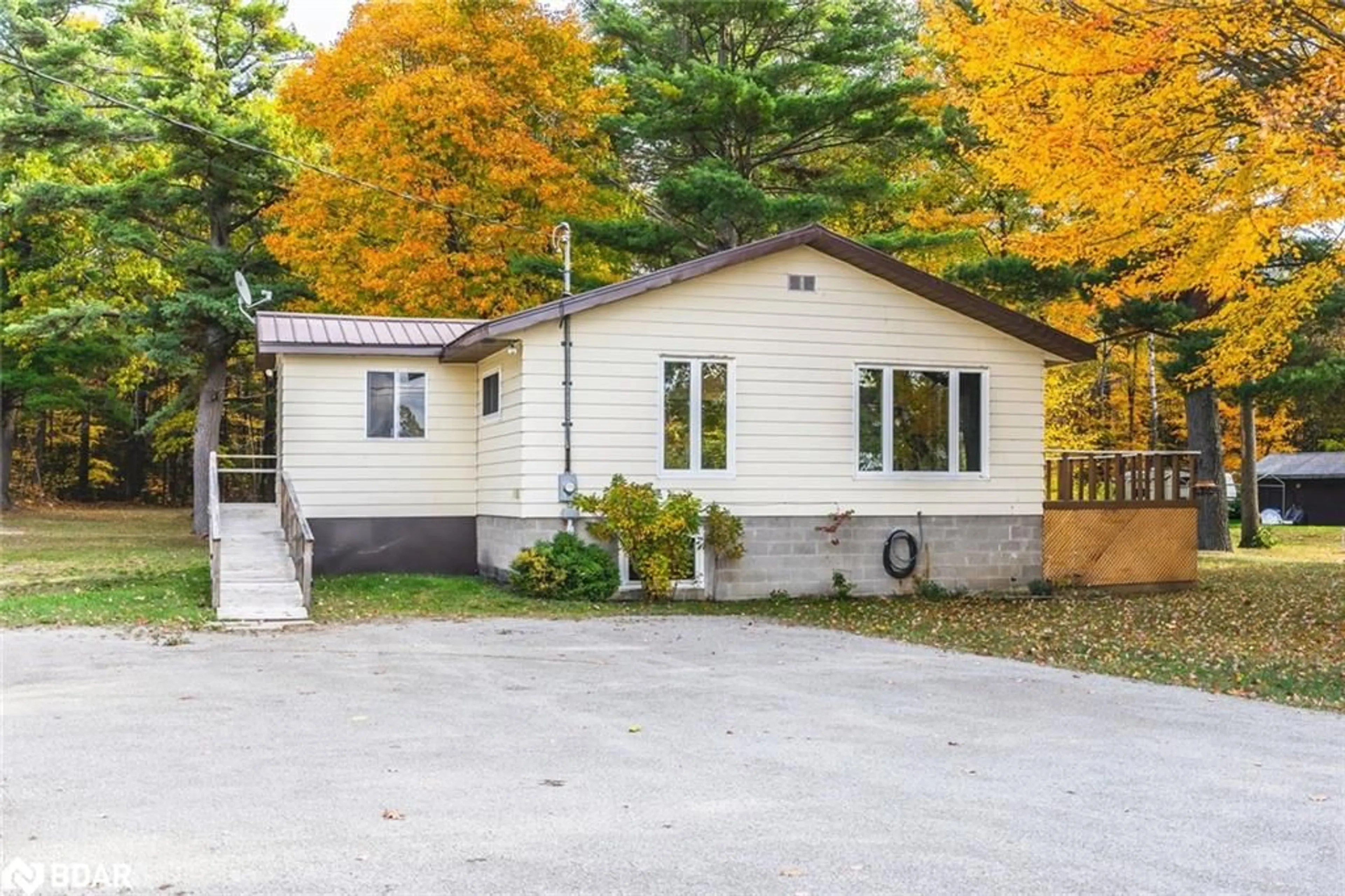 Home with vinyl exterior material, street for 332 Baxter Loop Rd, Honey Harbour Ontario L0K 1S0