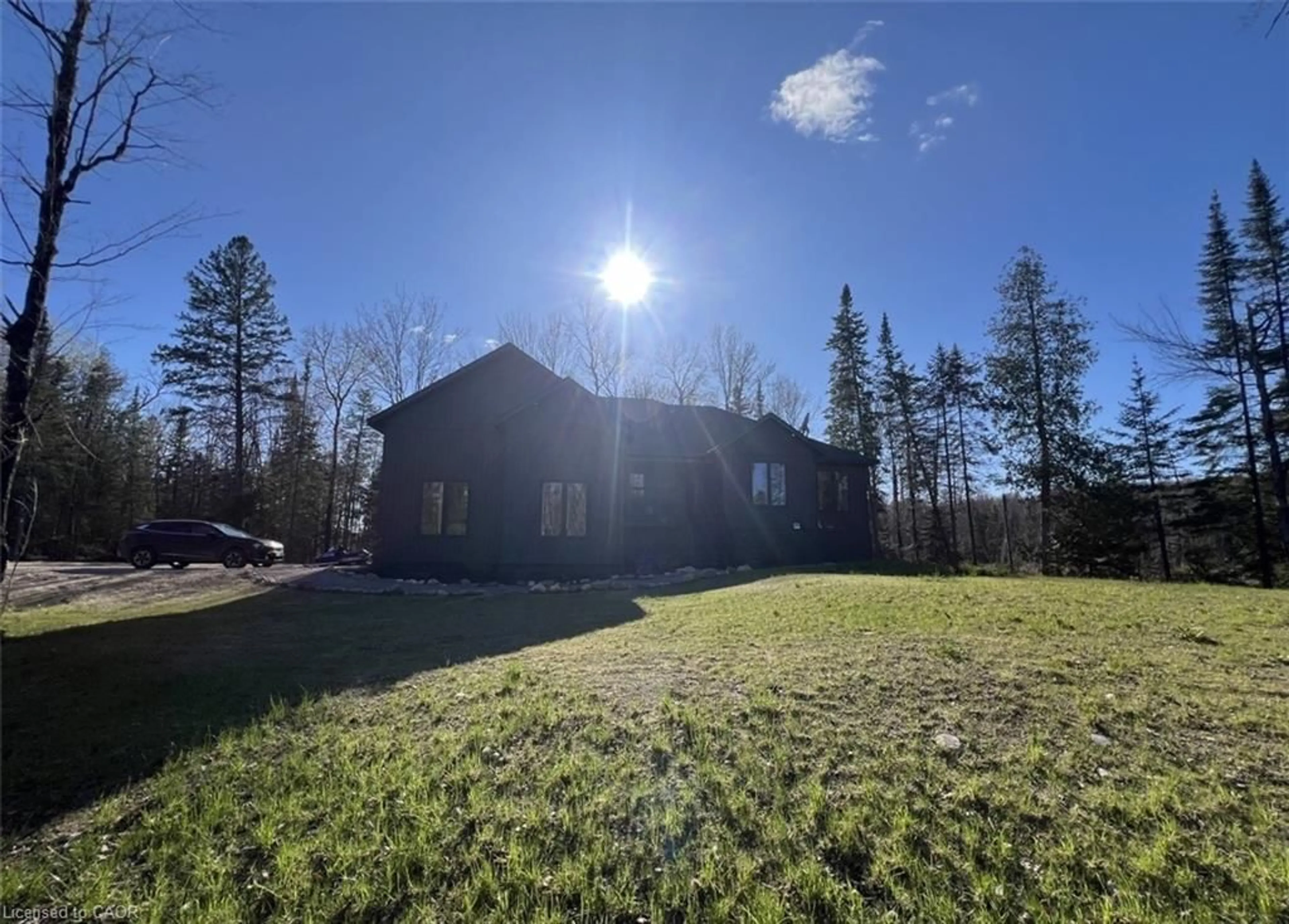 A pic from outside/outdoor area/front of a property/back of a property/a pic from drone, forest/trees view for 12407 Country Road 503, Tory Hill Ontario K0L 2Y0