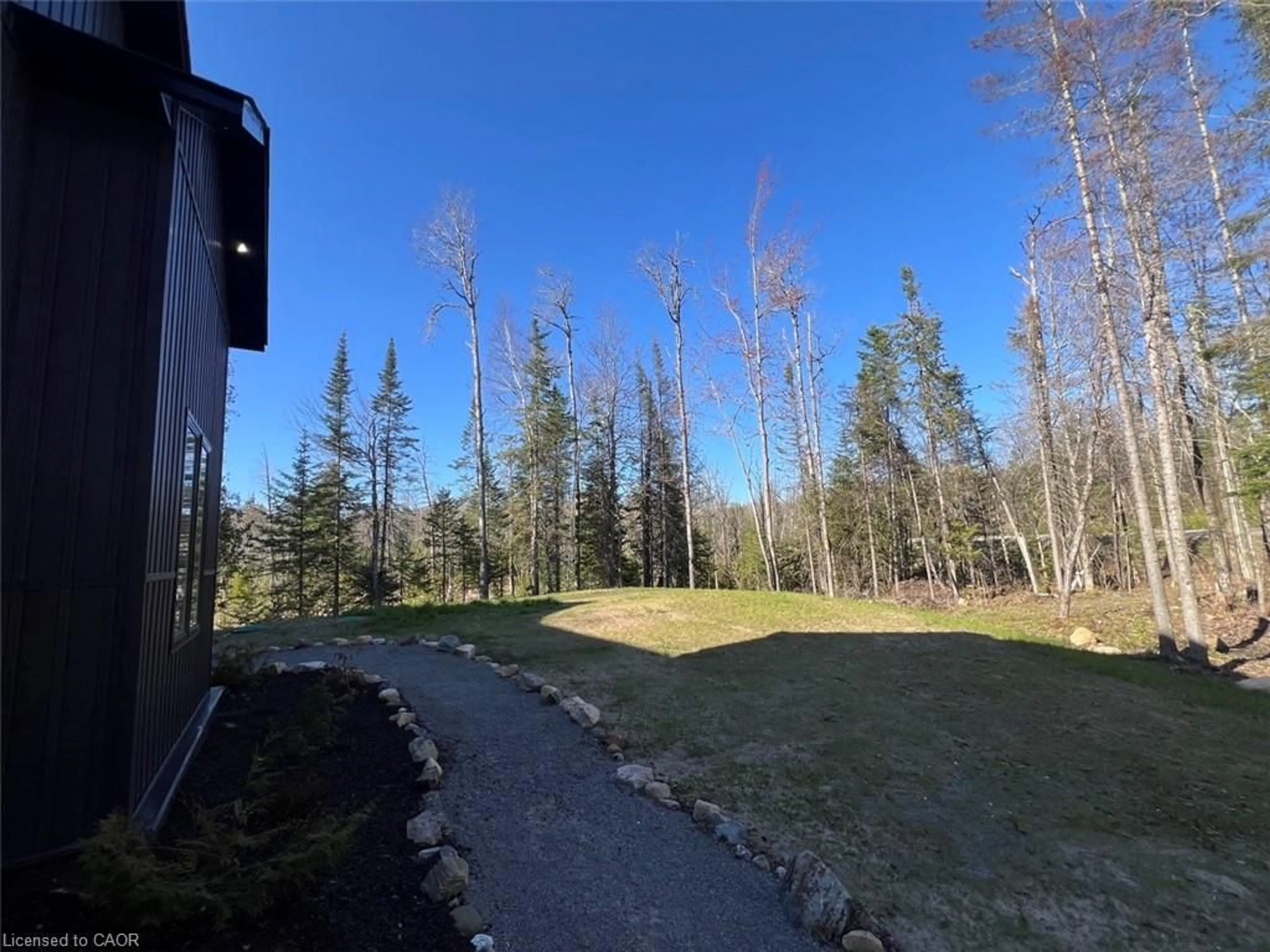A pic from outside/outdoor area/front of a property/back of a property/a pic from drone, forest/trees view for 12407 Country Road 503, Tory Hill Ontario K0L 2Y0
