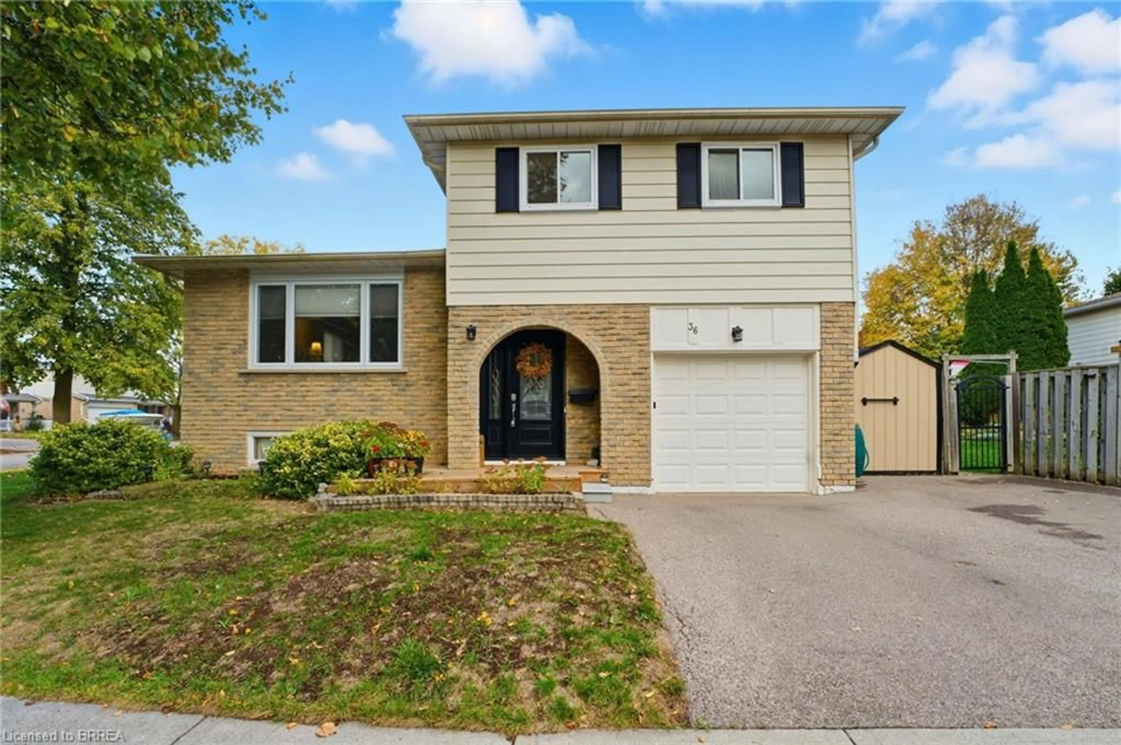 Home with brick exterior material, street for 36 King's Hill Lane, Brantford Ontario N3T 6A4