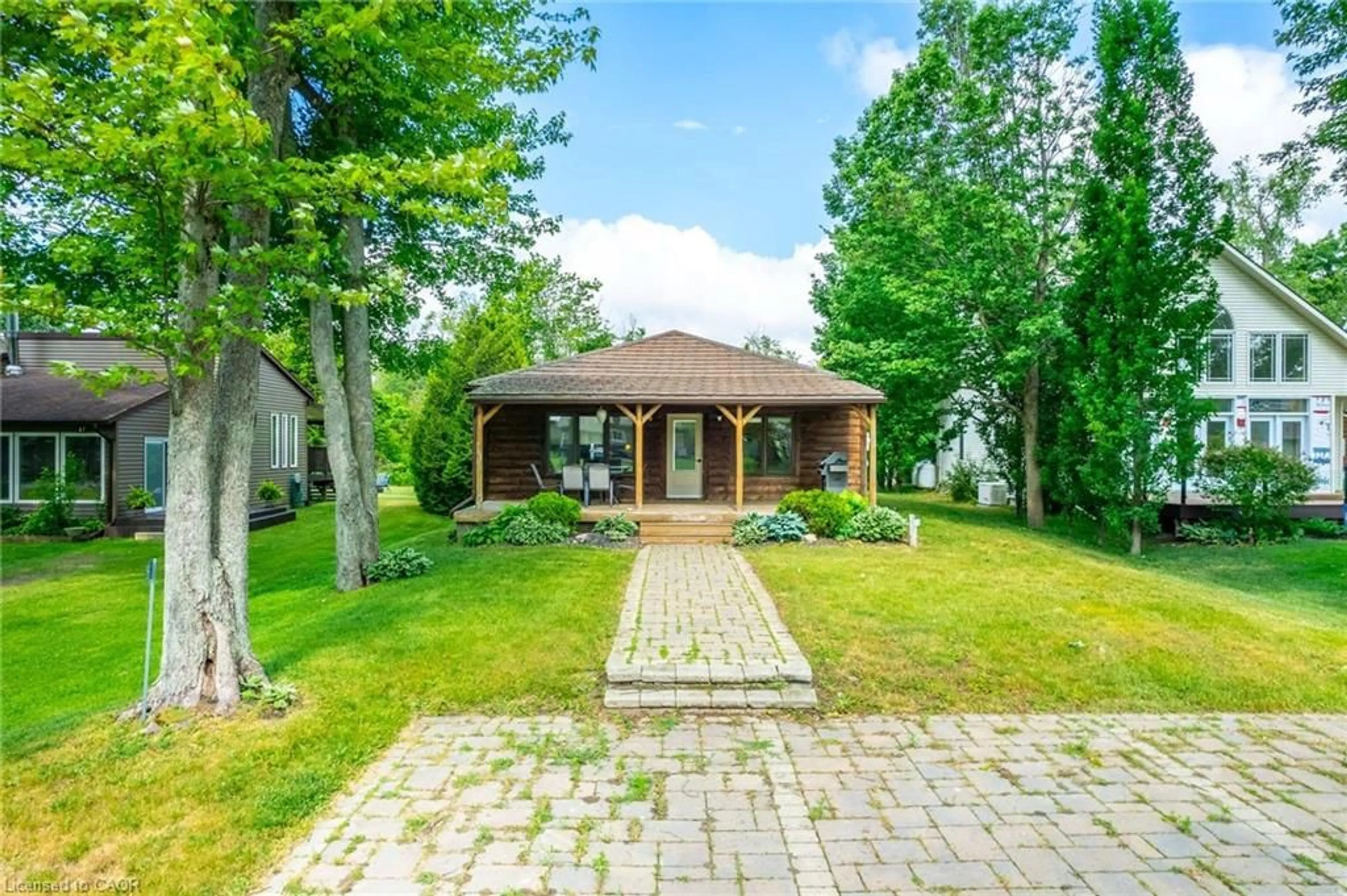 Home with brick exterior material, street for 15 Park Lane Cres, Turkey Point Ontario N0E 1T0