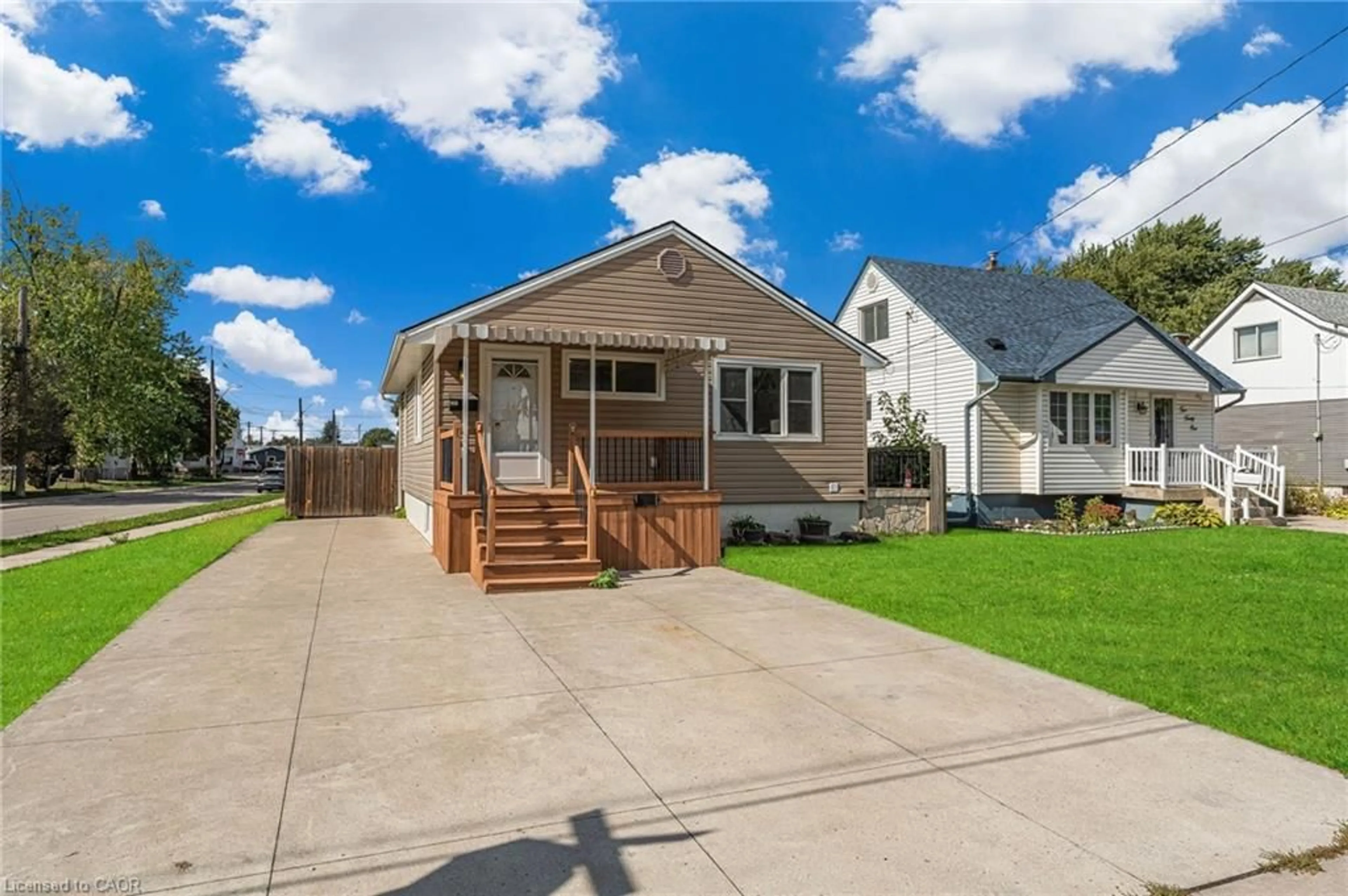 Home with vinyl exterior material, street for 237 Adair Ave, Hamilton Ontario L8H 6B3