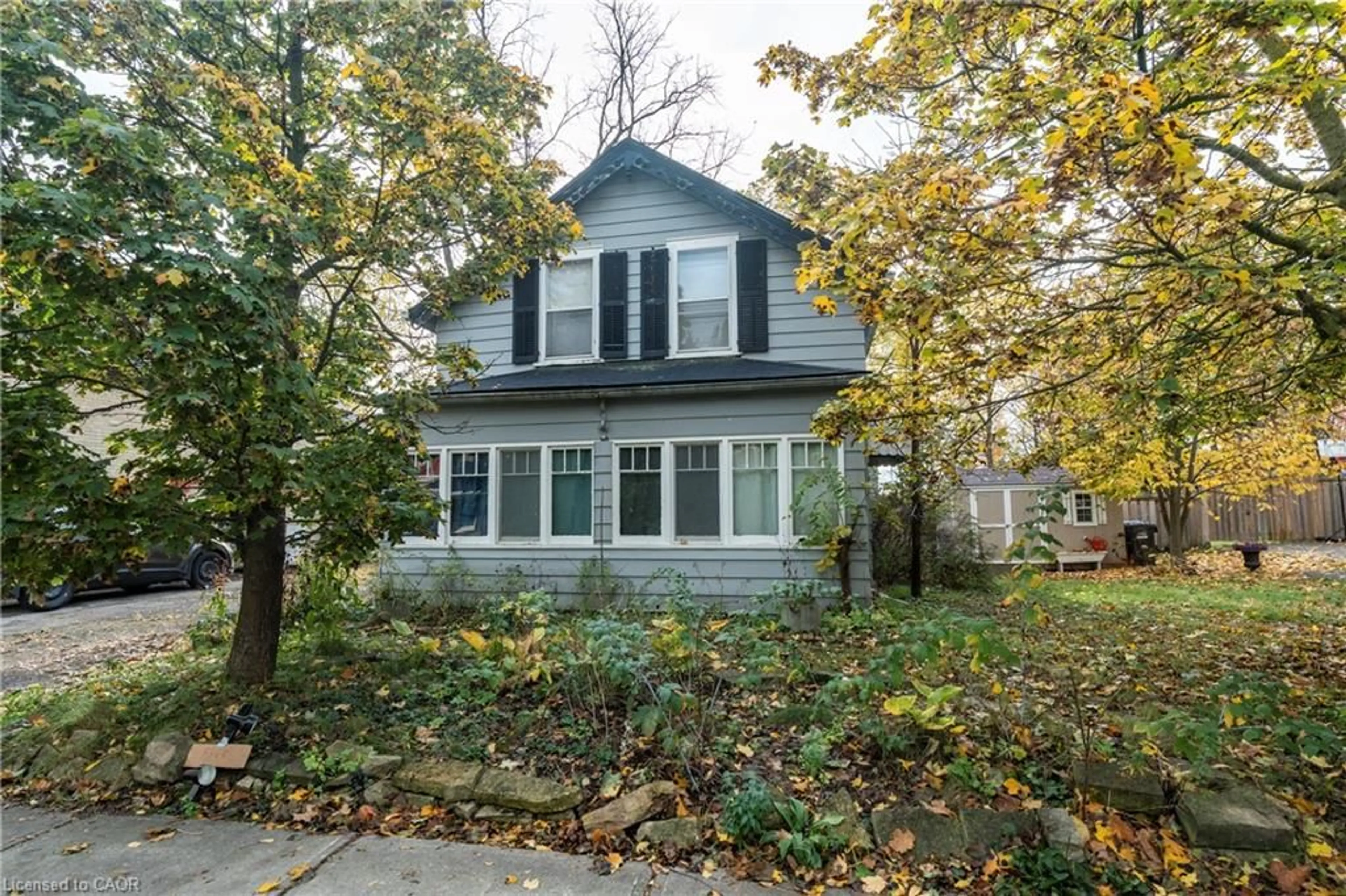 Home with vinyl exterior material, street for 18 Foster Ave Ave, Guelph Ontario N1H 3B3