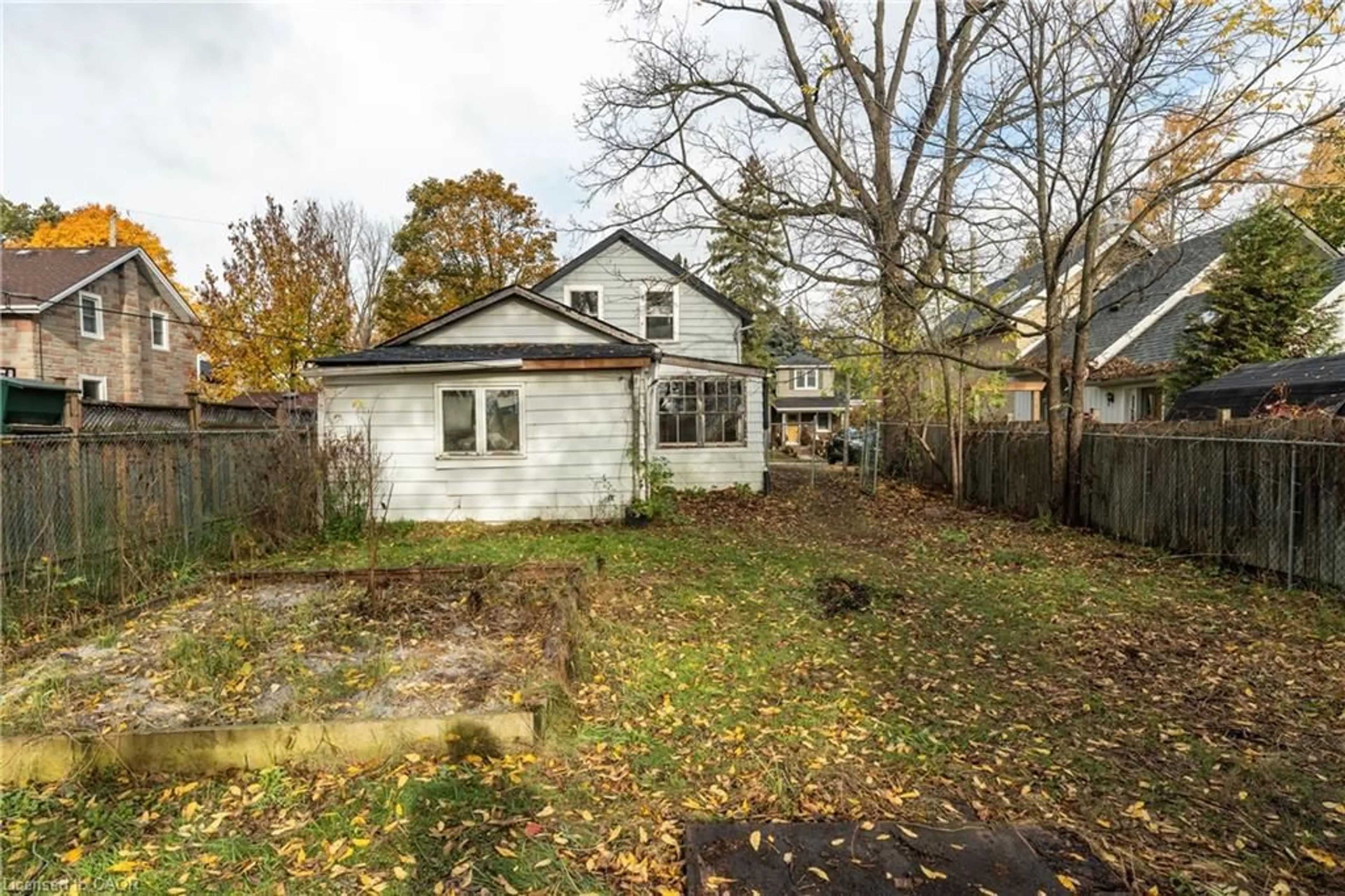 A pic from outside/outdoor area/front of a property/back of a property/a pic from drone, street for 18 Foster Ave Ave, Guelph Ontario N1H 3B3