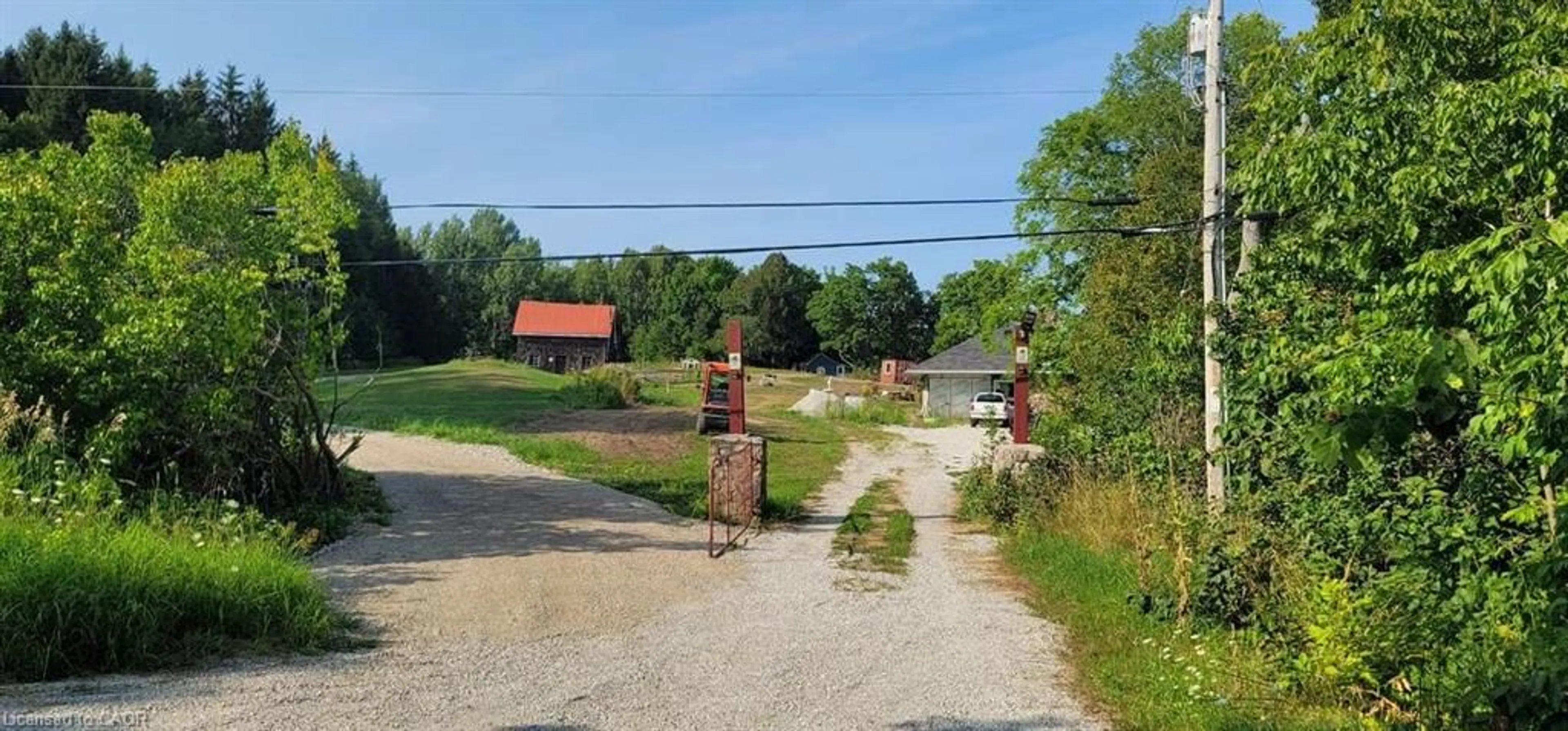 A pic from outside/outdoor area/front of a property/back of a property/a pic from drone, street for 50 Scotts Bluff Rd, Evansville Ontario P0P 1E0