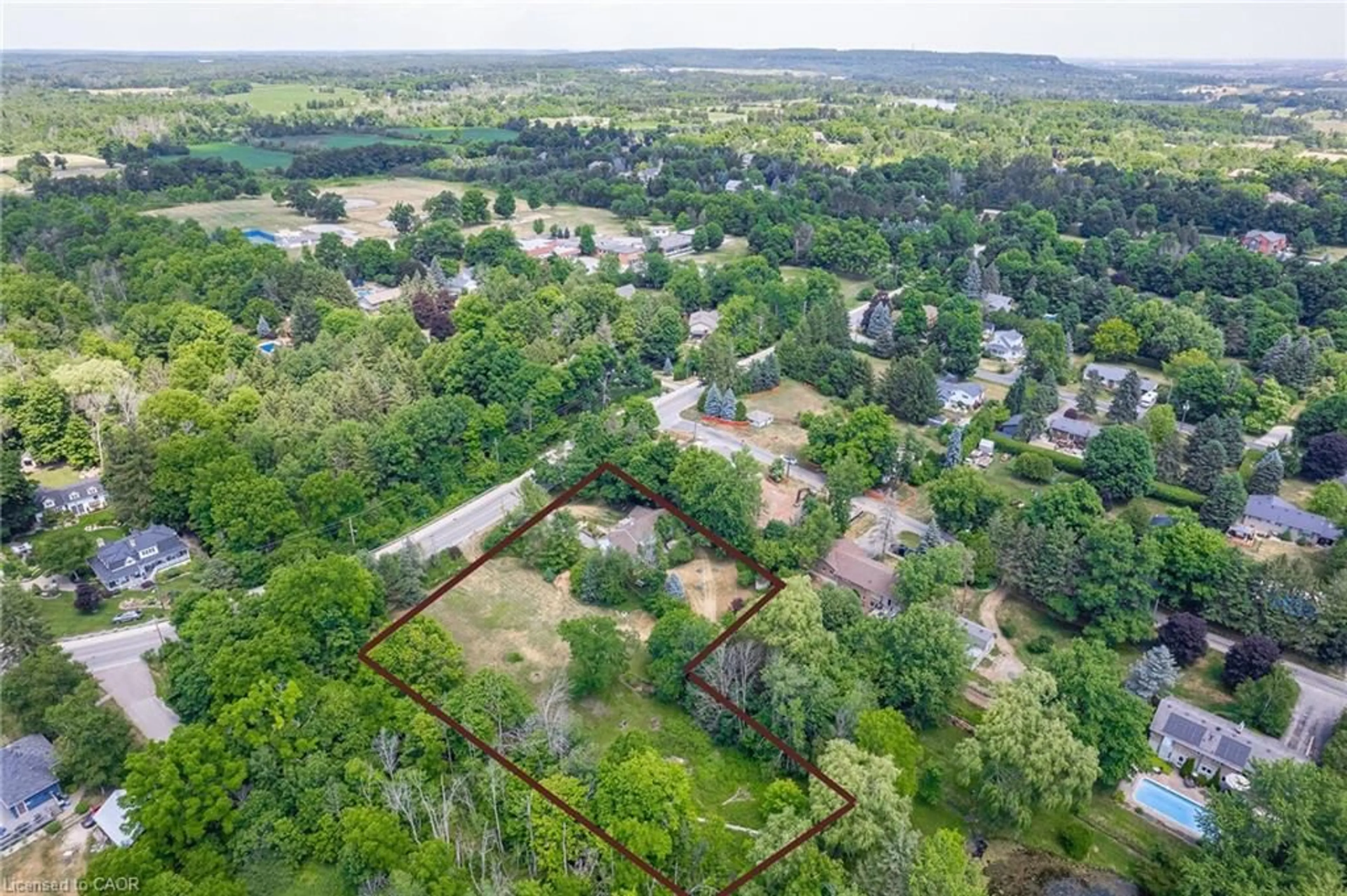A pic from outside/outdoor area/front of a property/back of a property/a pic from drone, forest/trees view for 2150 Kilbride St, Burlington Ontario L7P 0J3