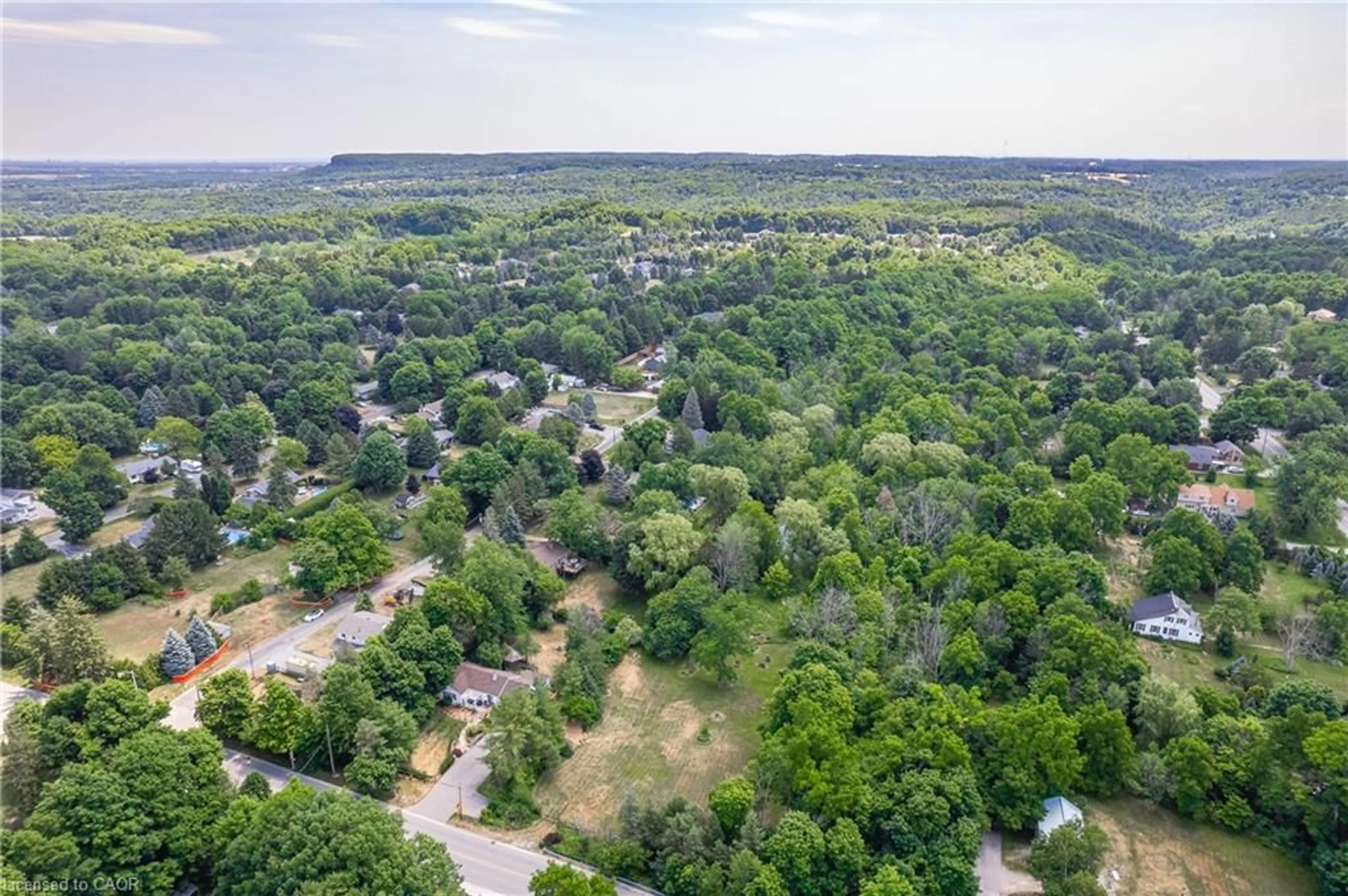 A pic from outside/outdoor area/front of a property/back of a property/a pic from drone, forest/trees view for 2150 Kilbride St, Burlington Ontario L7P 0J3