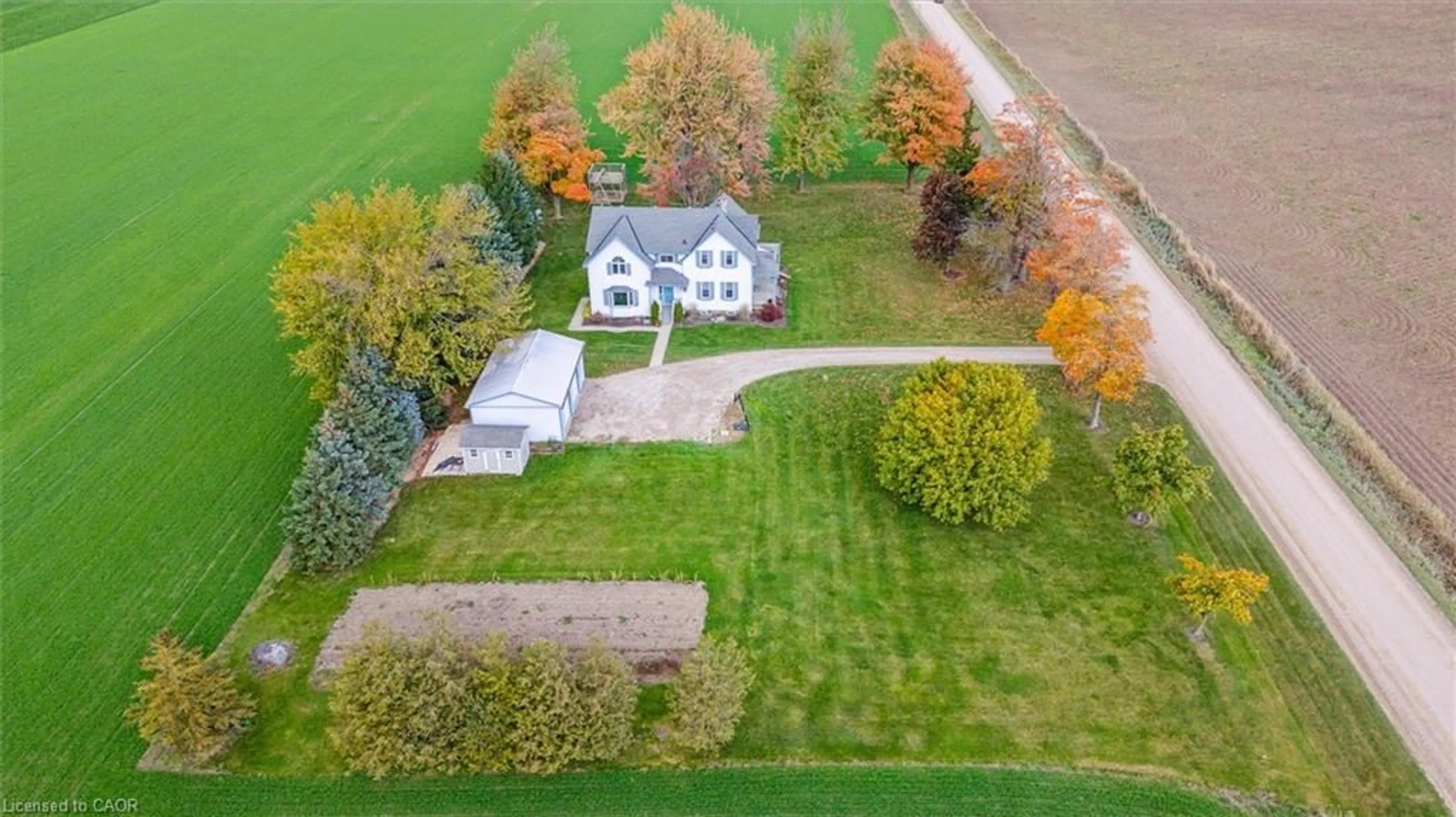 A pic from outside/outdoor area/front of a property/back of a property/a pic from drone, street for 7500 Road 129, Listowel Ontario N4W 3G9