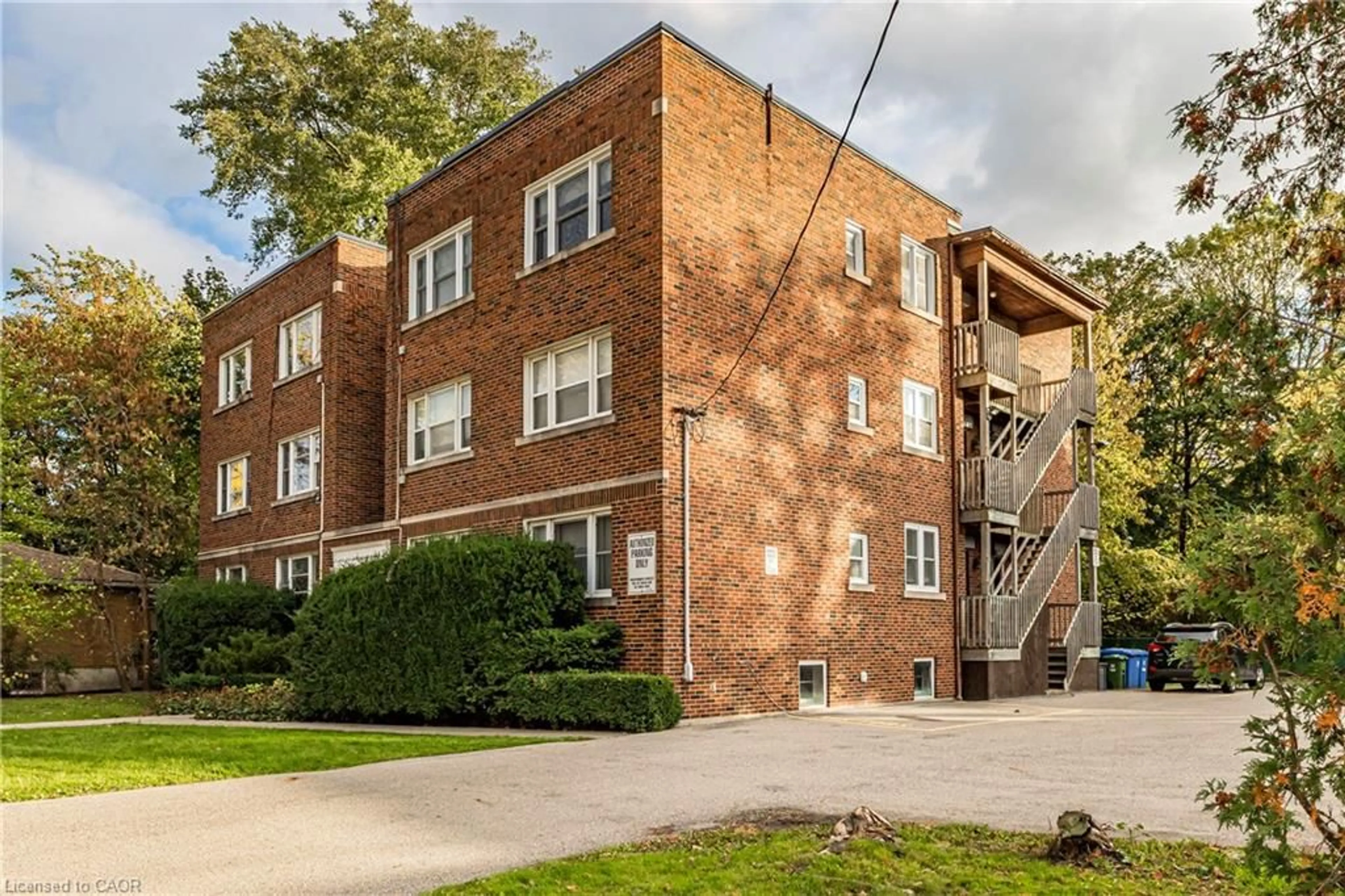 Home with brick exterior material, street for 1253 Main St #3, Hamilton Ontario L8S 1C4