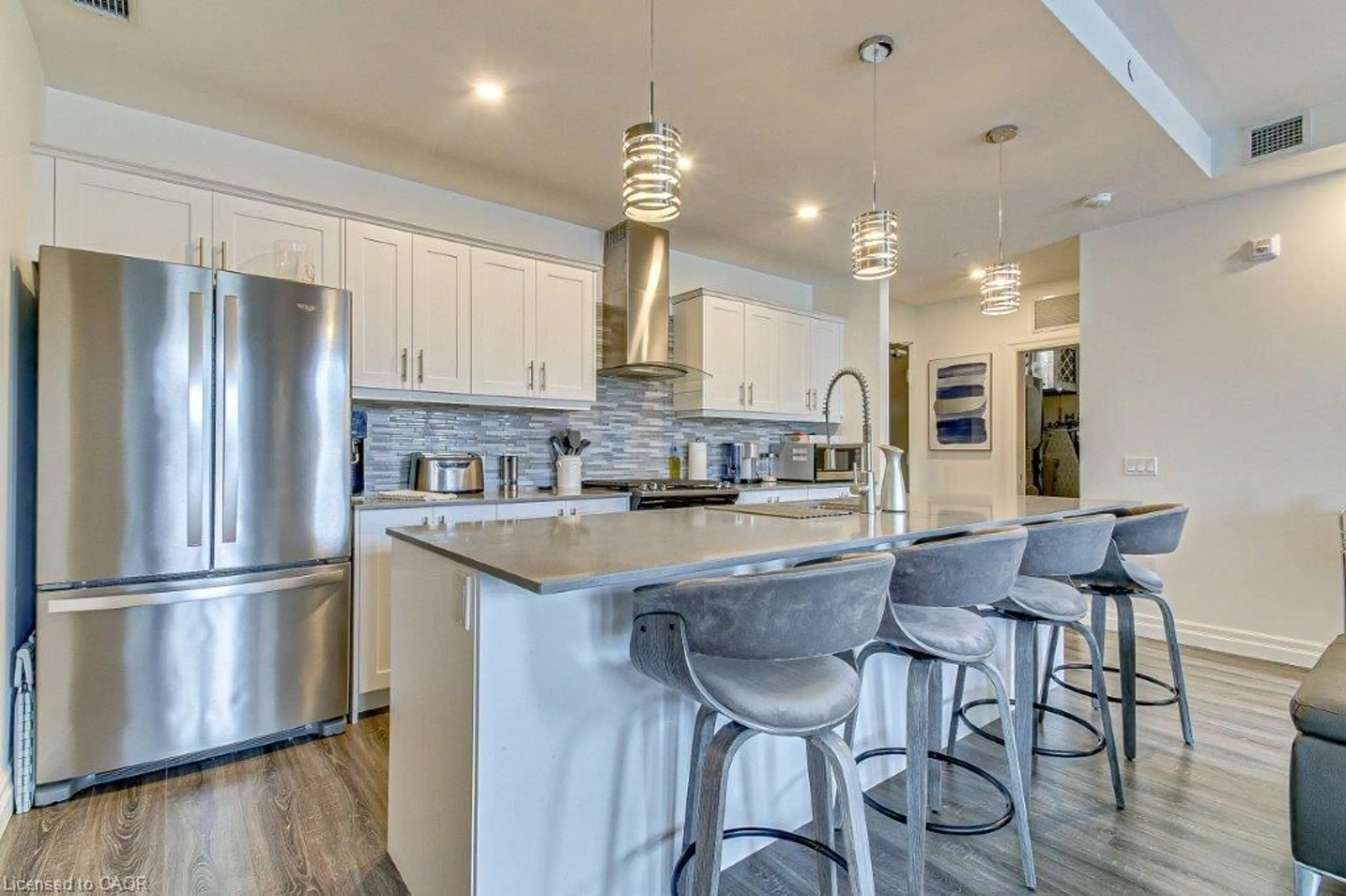 Open concept kitchen, ceramic/tile floor for 38 Harbour St #214, Port Dover Ontario N0A 1N0