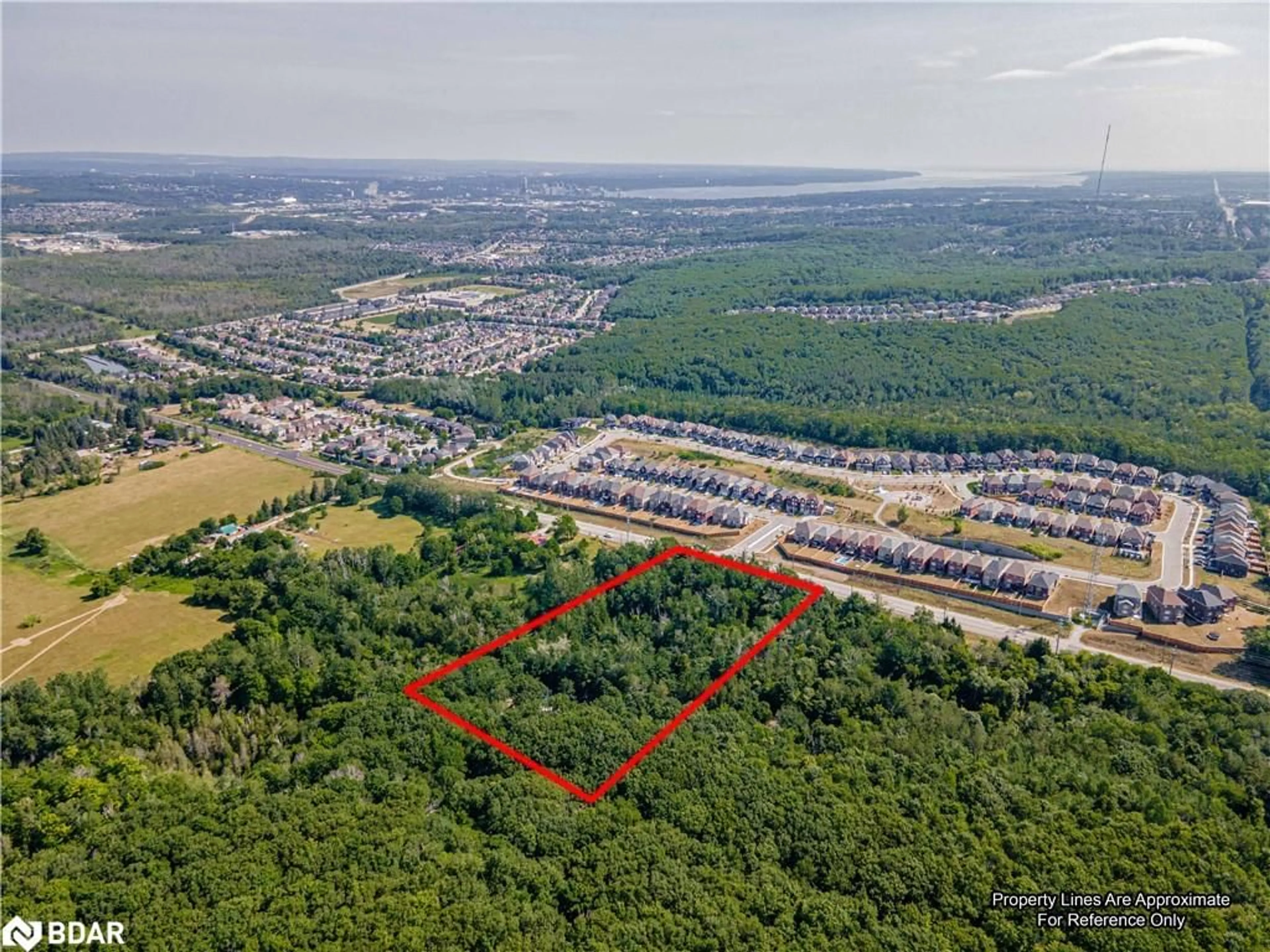 A pic from outside/outdoor area/front of a property/back of a property/a pic from drone, forest/trees view for 8294 County Rd 27, Barrie Ontario L4N 9C4