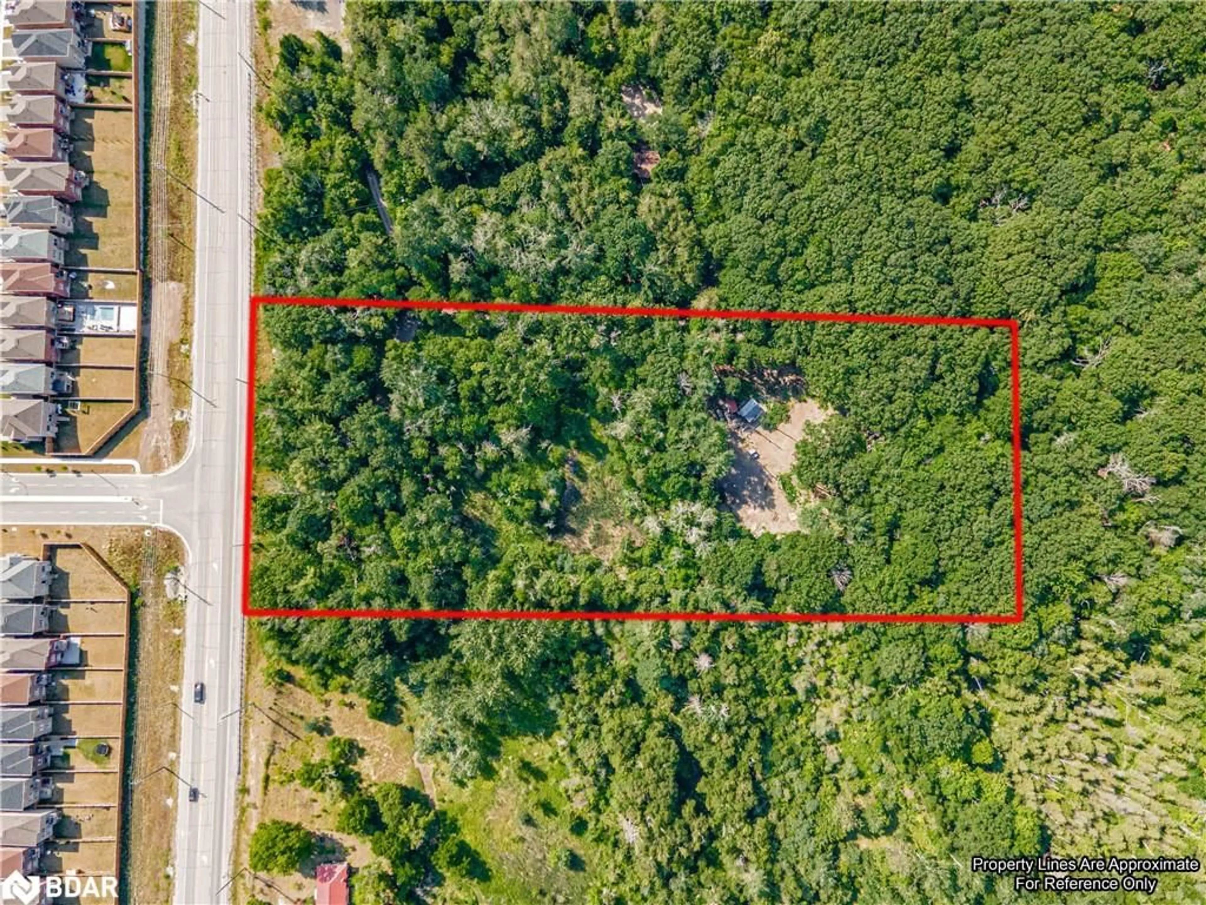 A pic from outside/outdoor area/front of a property/back of a property/a pic from drone, forest/trees view for 8294 County Rd 27, Barrie Ontario L4N 9C4