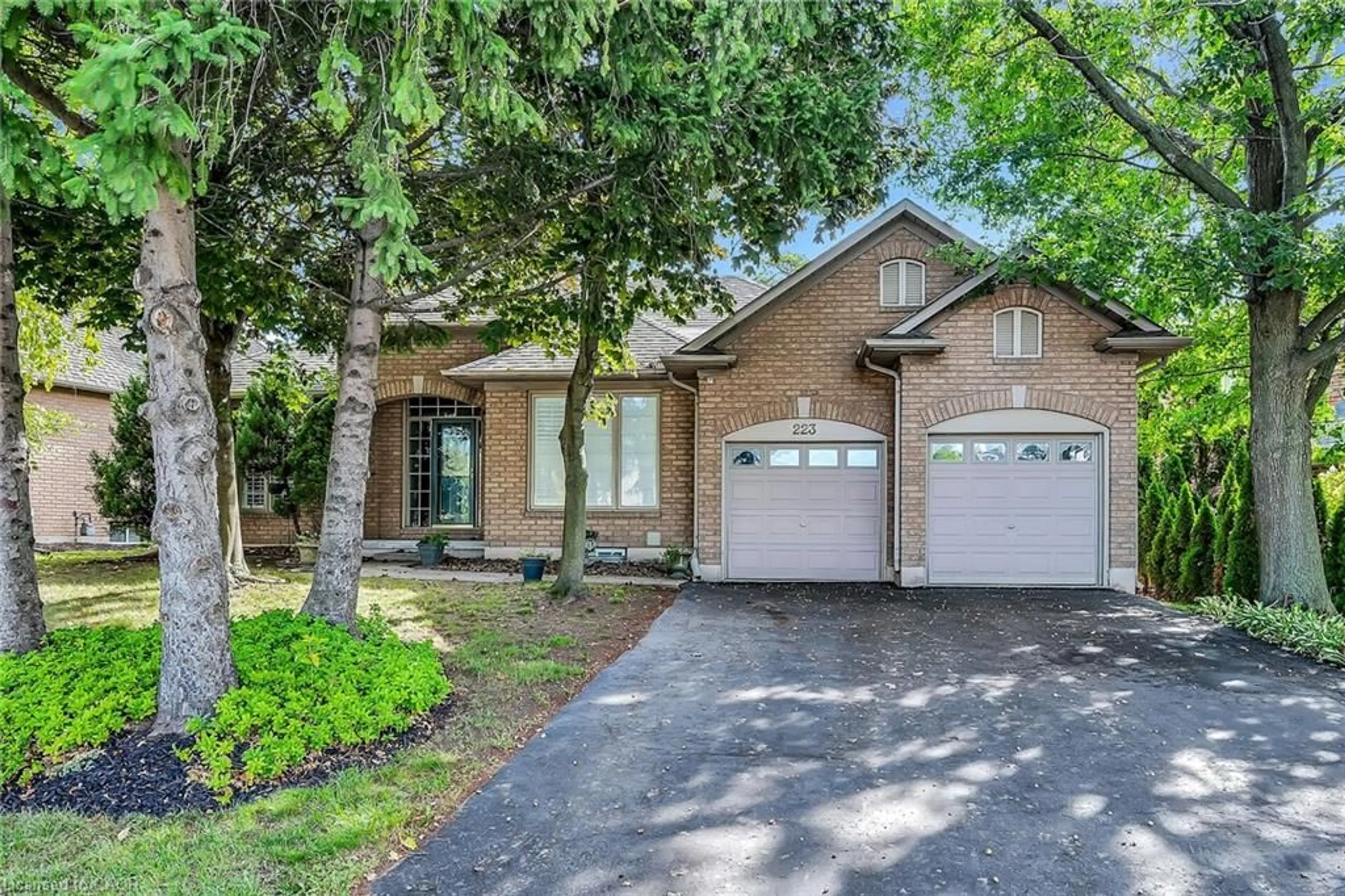 Home with brick exterior material, street for 223 Greenbriar Rd, Ancaster Ontario L9G 3V9