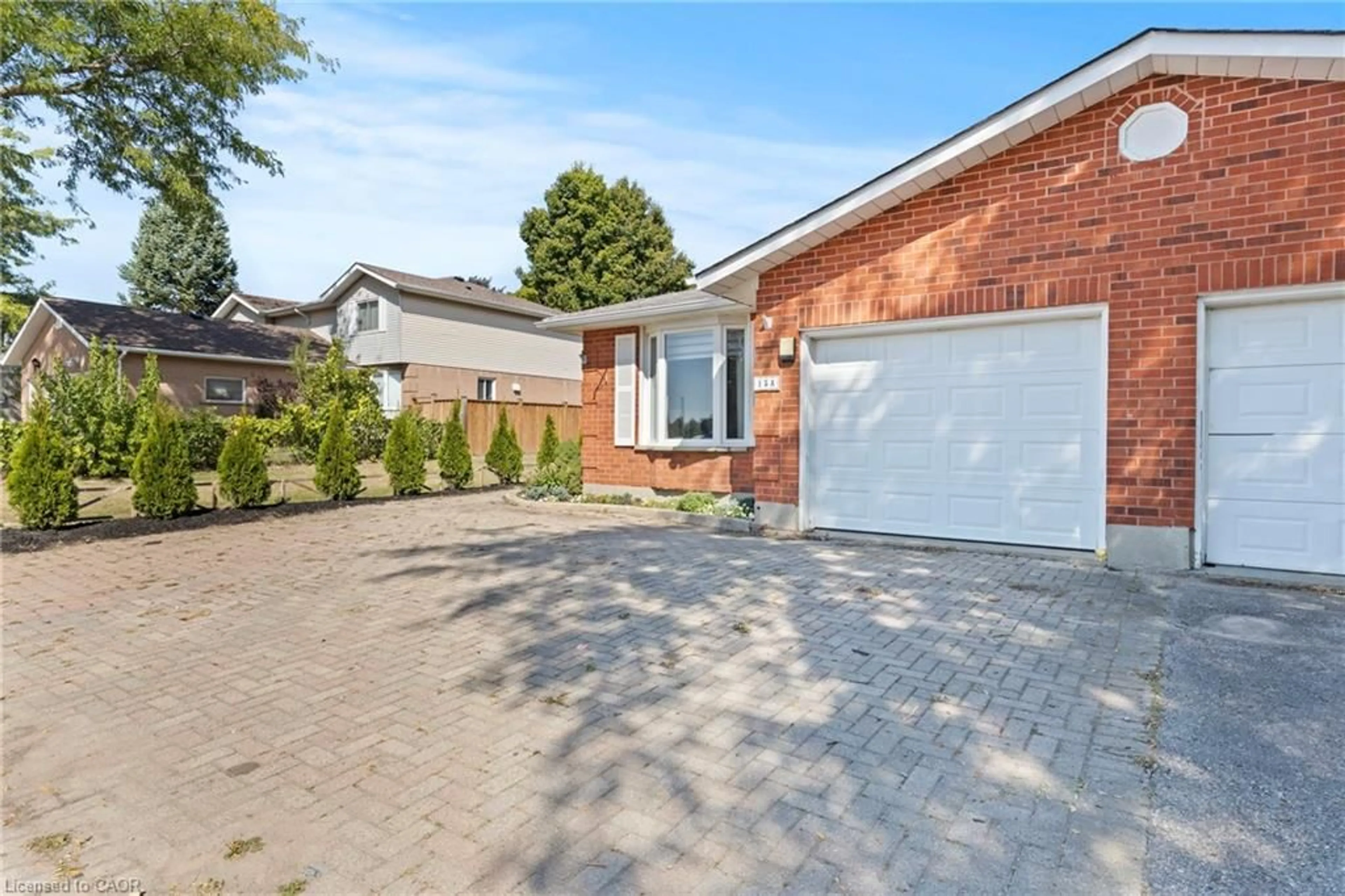 Home with brick exterior material, street for 15 Oak Ave #a, Paris Ontario N3L 3C6