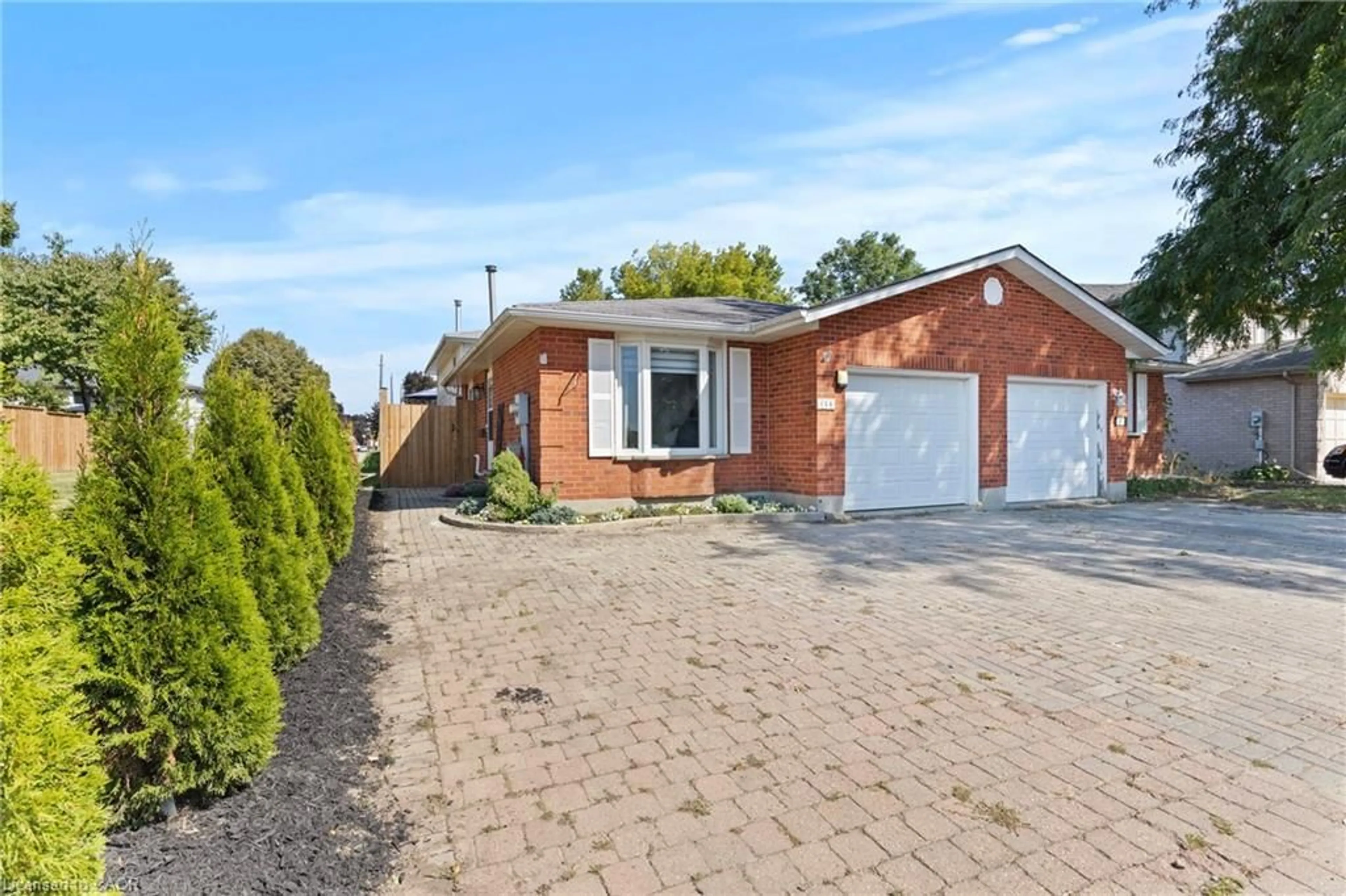 Home with brick exterior material, street for 15 Oak Ave #a, Paris Ontario N3L 3C6