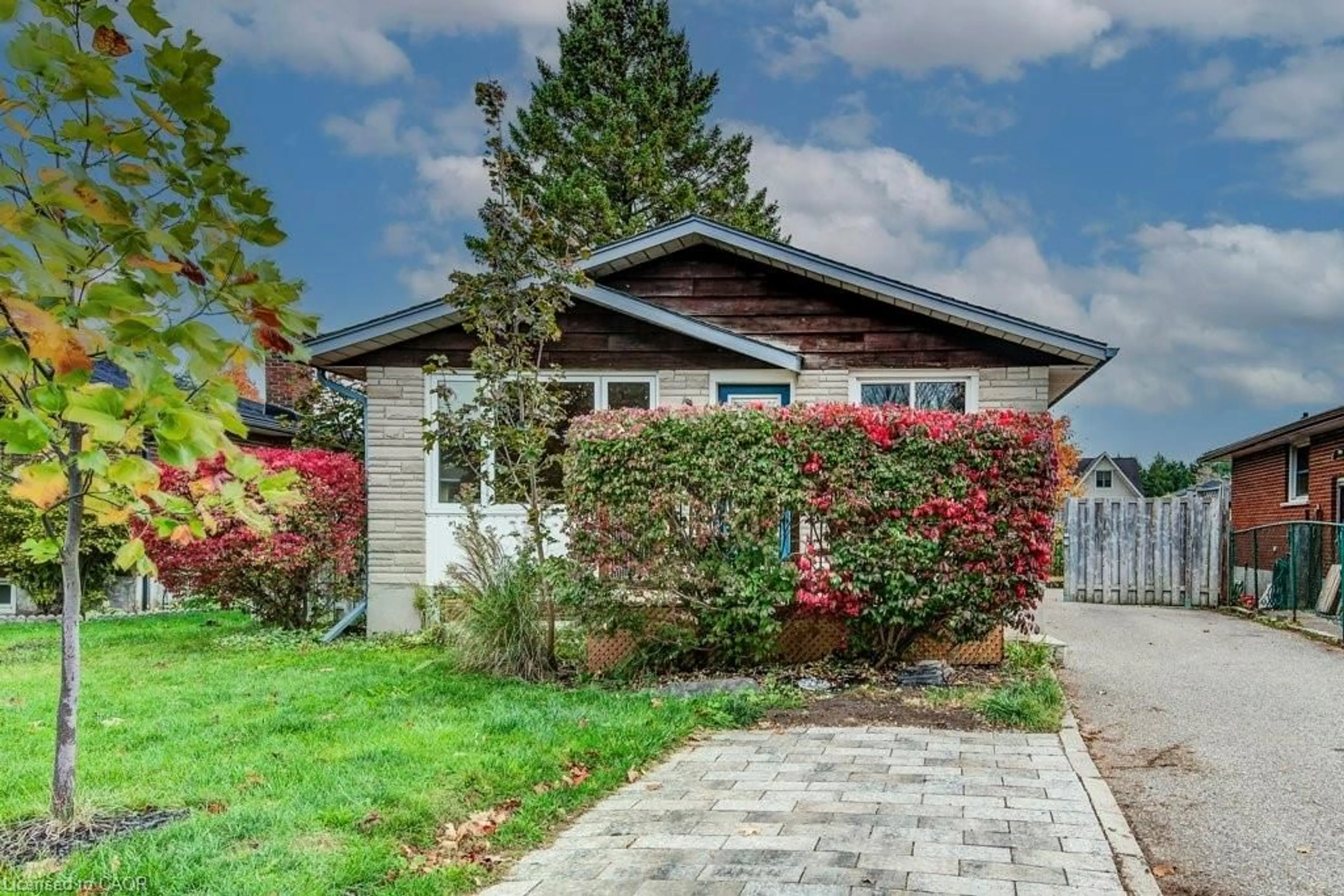 Home with brick exterior material, street for 92 Brant Ave, Guelph Ontario N1E 1G3