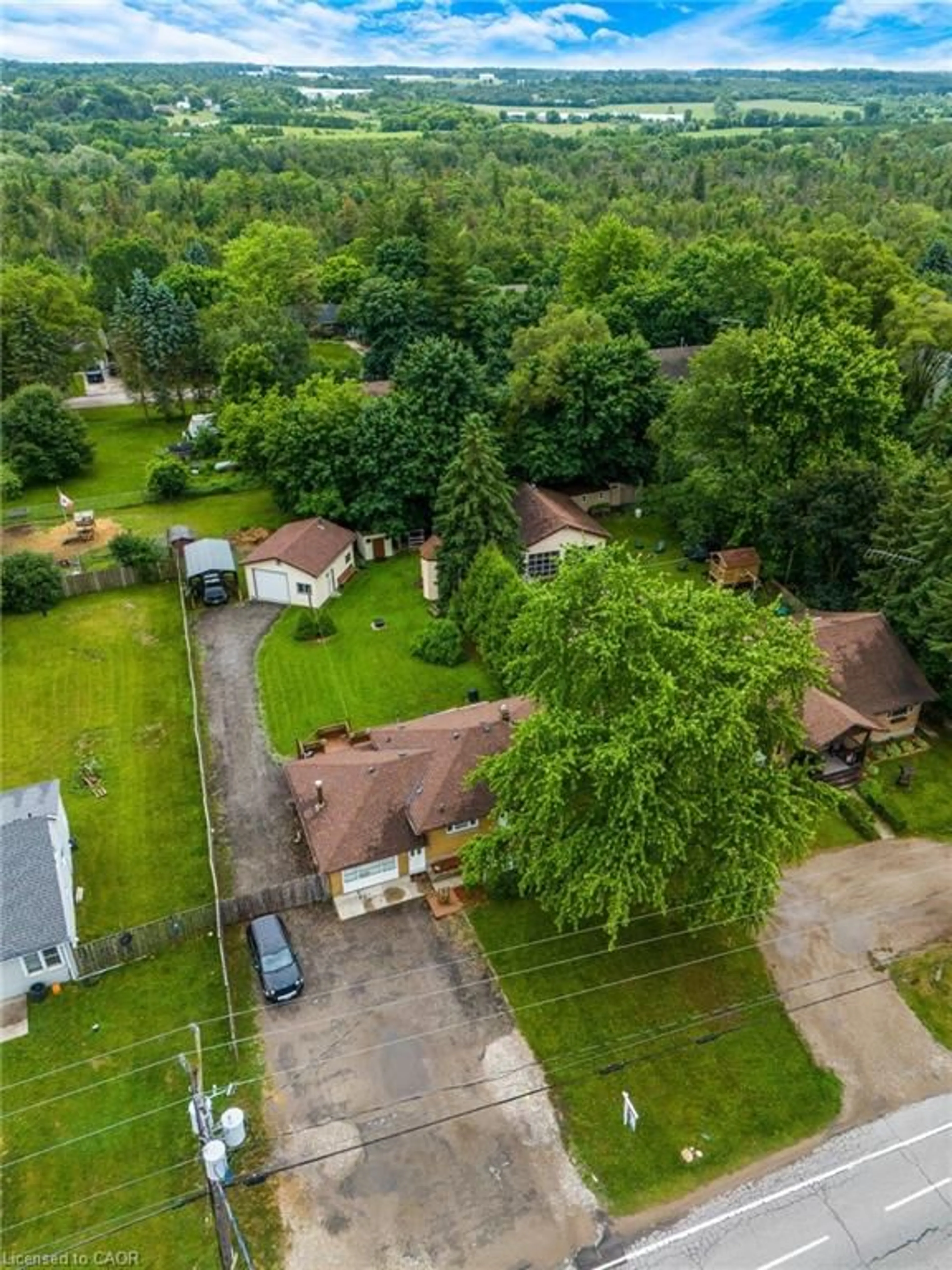 A pic from outside/outdoor area/front of a property/back of a property/a pic from drone, street for 7011 Wellington Road 124 Rd, Guelph/Eramosa Ontario N1H 6J4