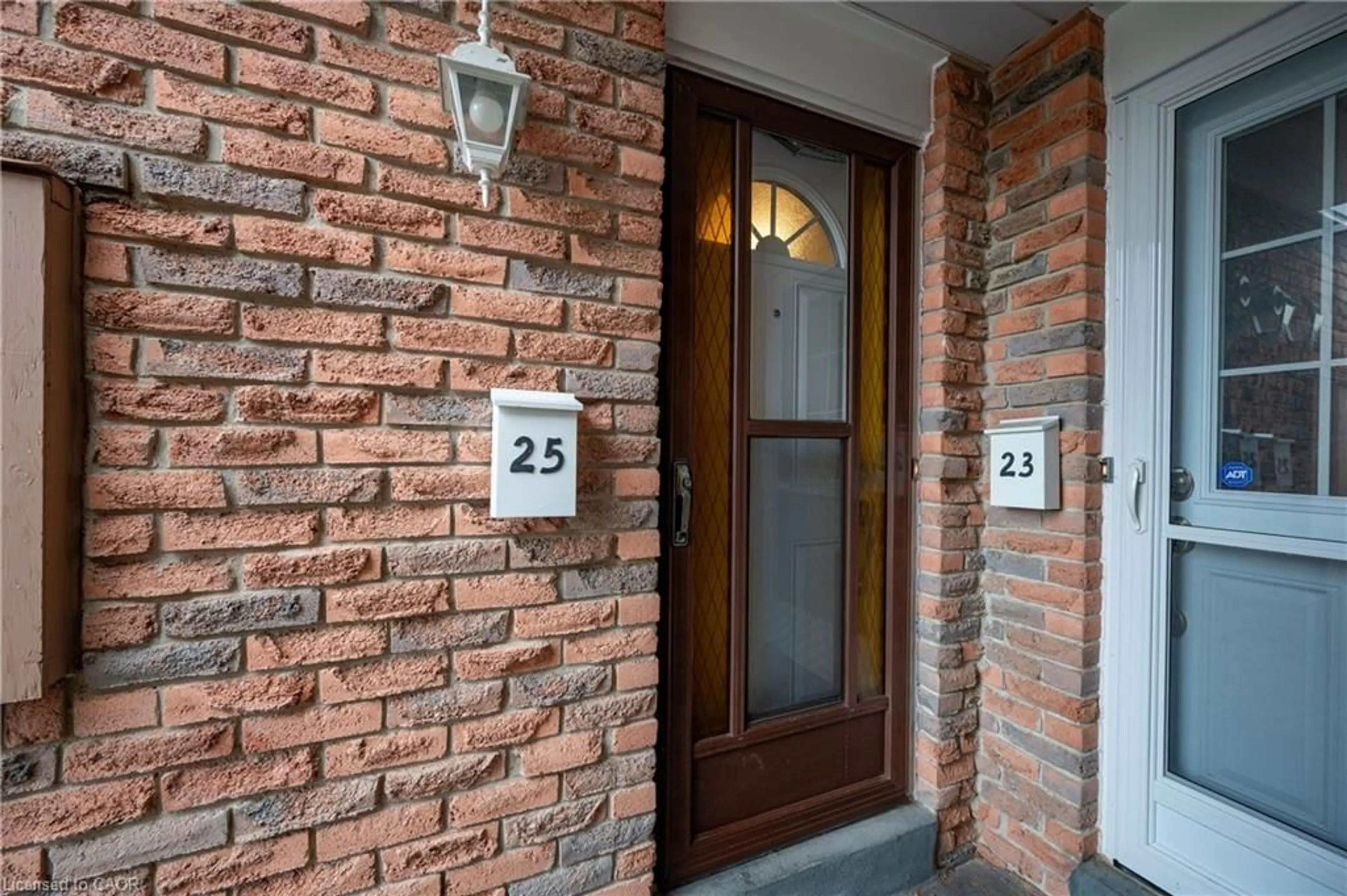 Home with brick exterior material, street for 169 Elm Ridge Dr #25, Kitchener Ontario N2N 1L7