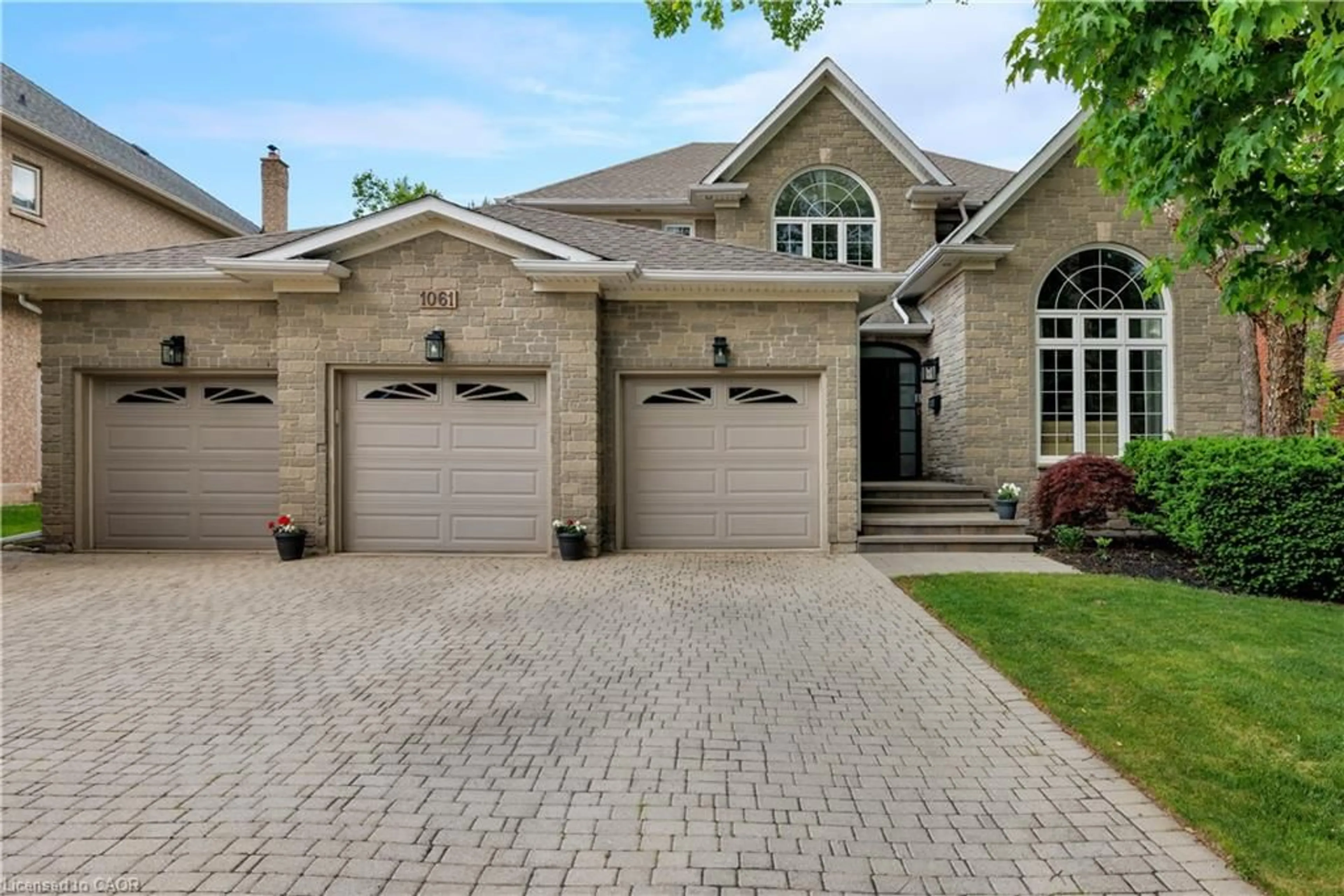 Home with brick exterior material, street for 1061 Summit Ridge Dr, Oakville Ontario L6M 3K9
