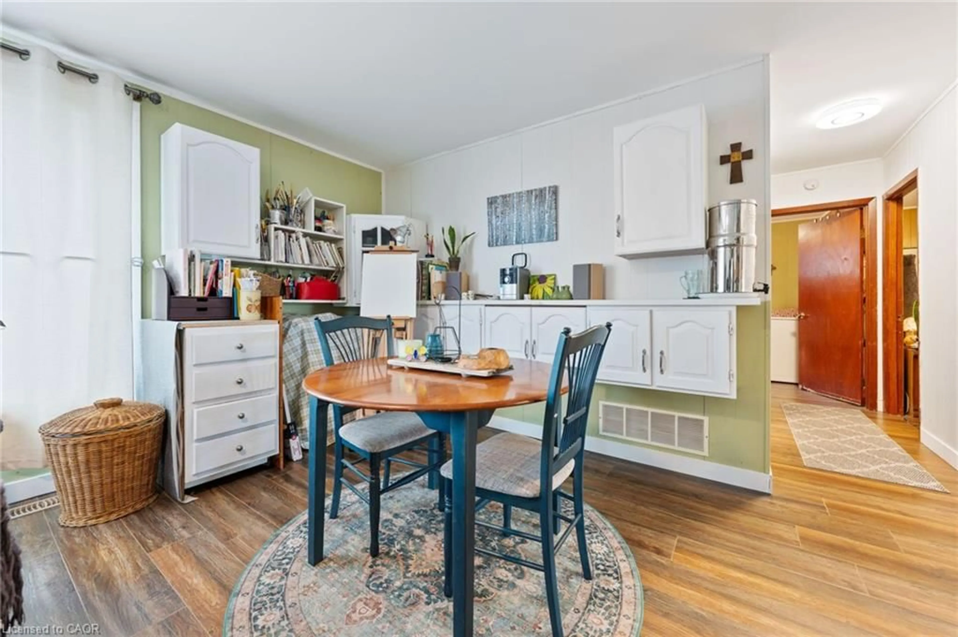 Open concept kitchen, wood/laminate floor for 30 Bee St, Booth's Harbour Ontario N0E 1P0