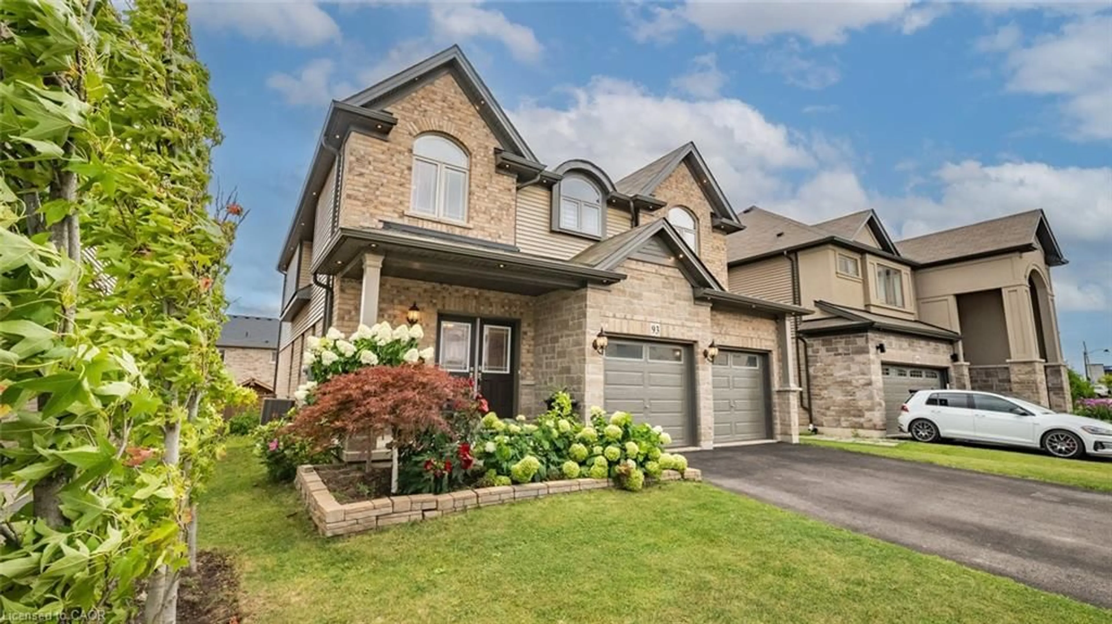 Home with brick exterior material, street for 93 Lorne Card Dr, Paris Ontario N3L 0E7