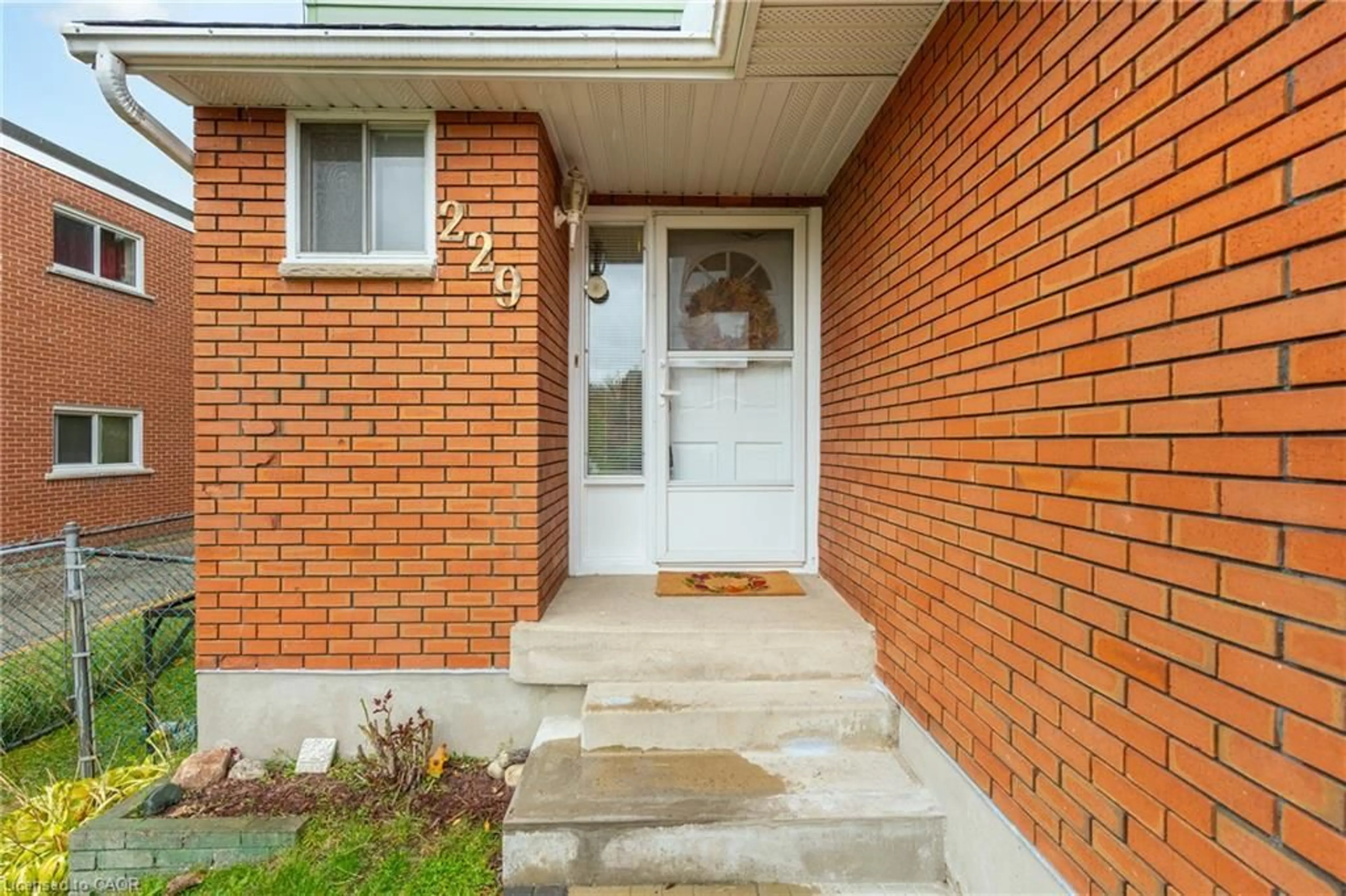 Home with brick exterior material, street for 229 Veronica Dr, Kitchener Ontario N2A 2R8