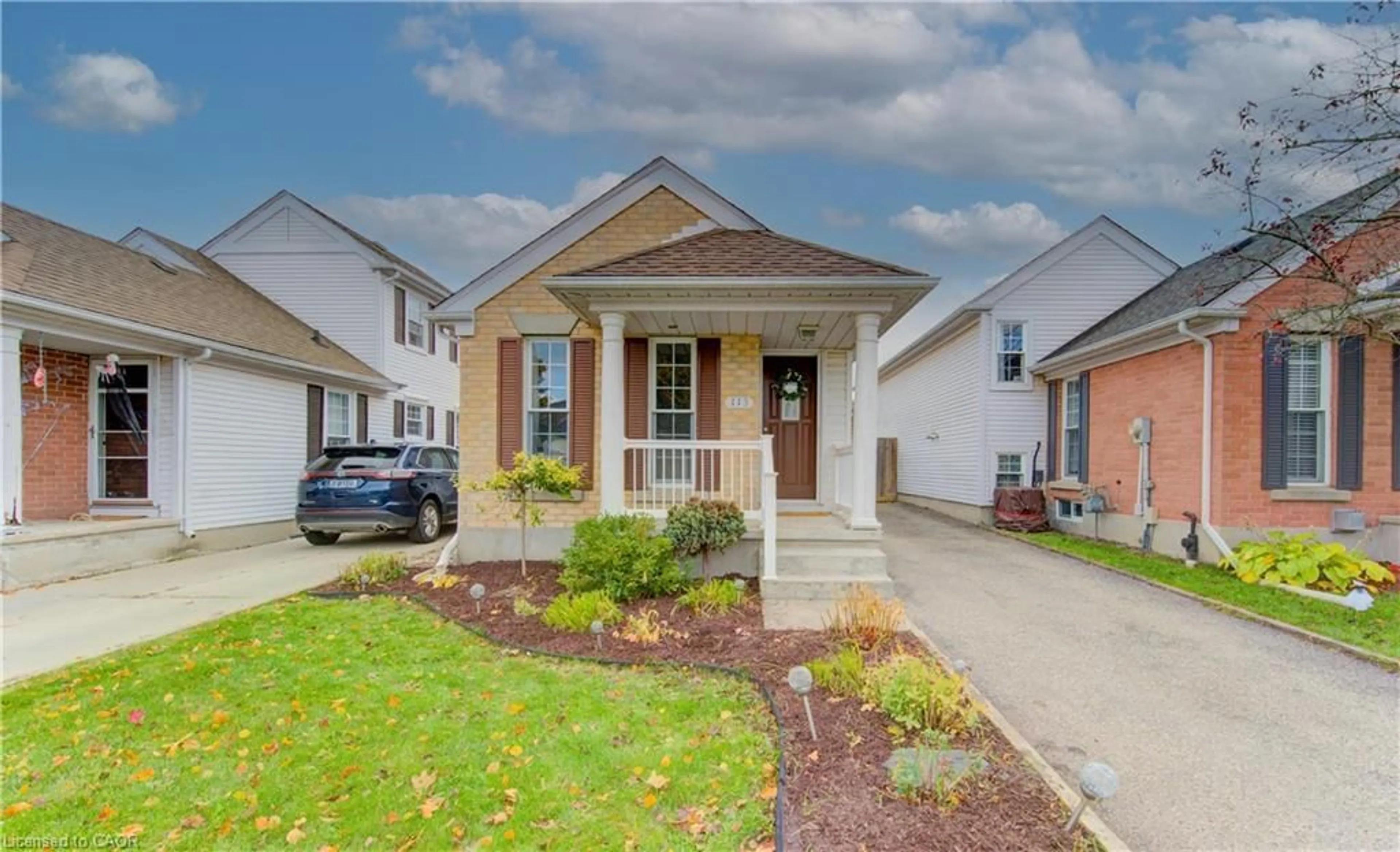 Home with brick exterior material, street for 113 Wake Robin Dr, Kitchener Ontario N2E 3L4